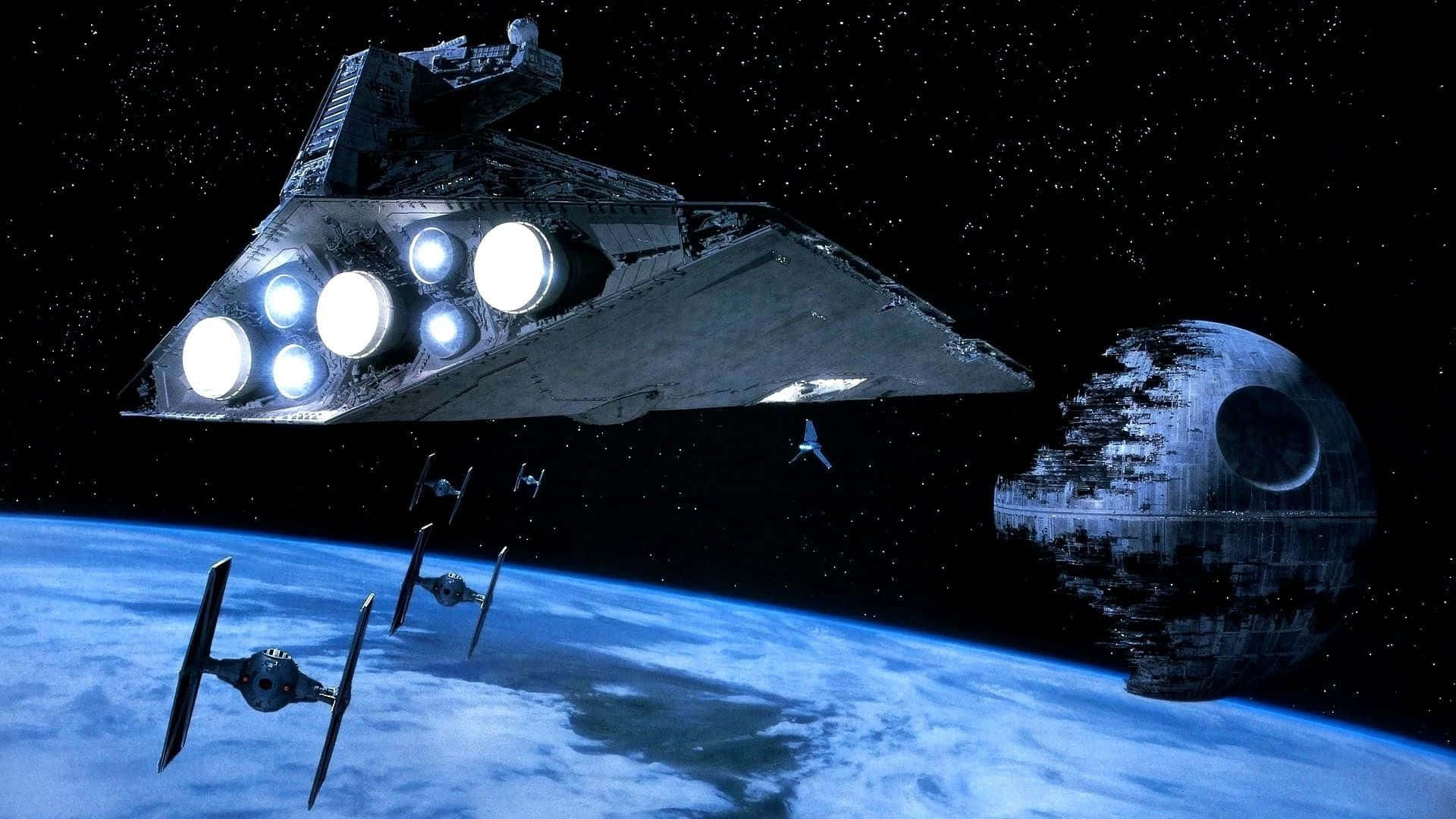 Return Of The Jedi 桌布 壁紙 — 一艘星際驅逐艦和TIE戰鬥機在藍色行星上空翱翔，死星在星空中隱現。