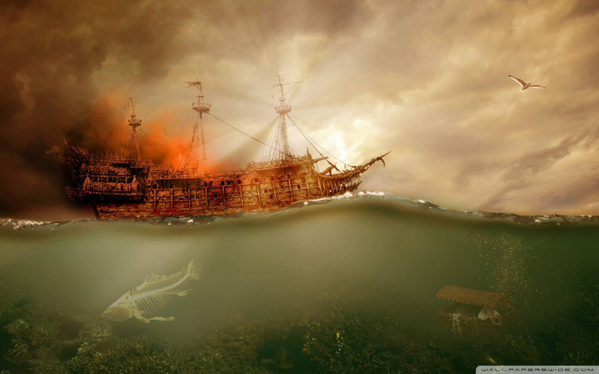 Ghost Ship 桌布 壁紙 — 一艘沉沒的海盜船在水面上燃燒，而魚骨和寶箱則在渾濁的綠色深處休息。