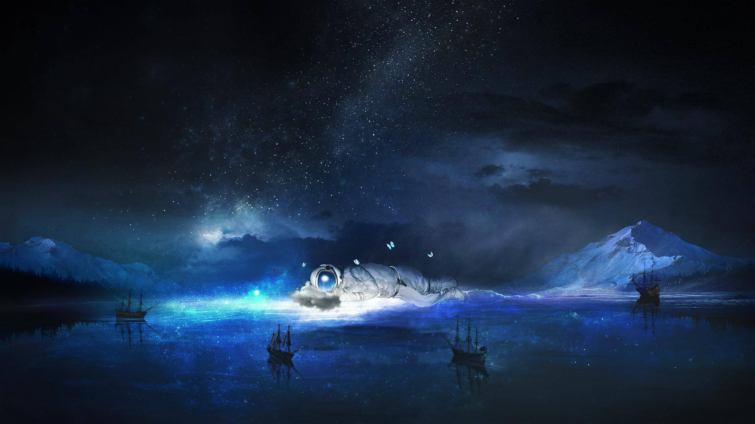dreamy 桌布 壁紙 — 一艘發光的外星飛船停泊在星光閃爍的冰凍湖面上，周圍是白雪覆蓋的山脈和帆船。