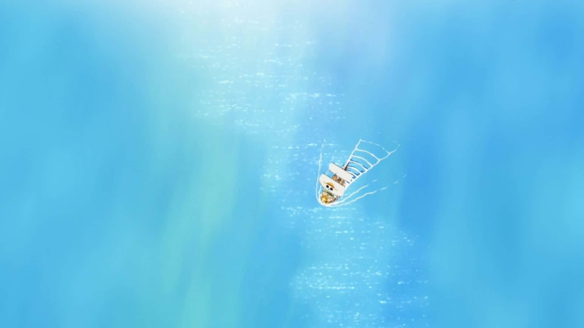 Going Merry 桌布 壁紙 — 一艘白色小帆船在燦爛的陽光下，滑過閃閃發光的碧綠海水。