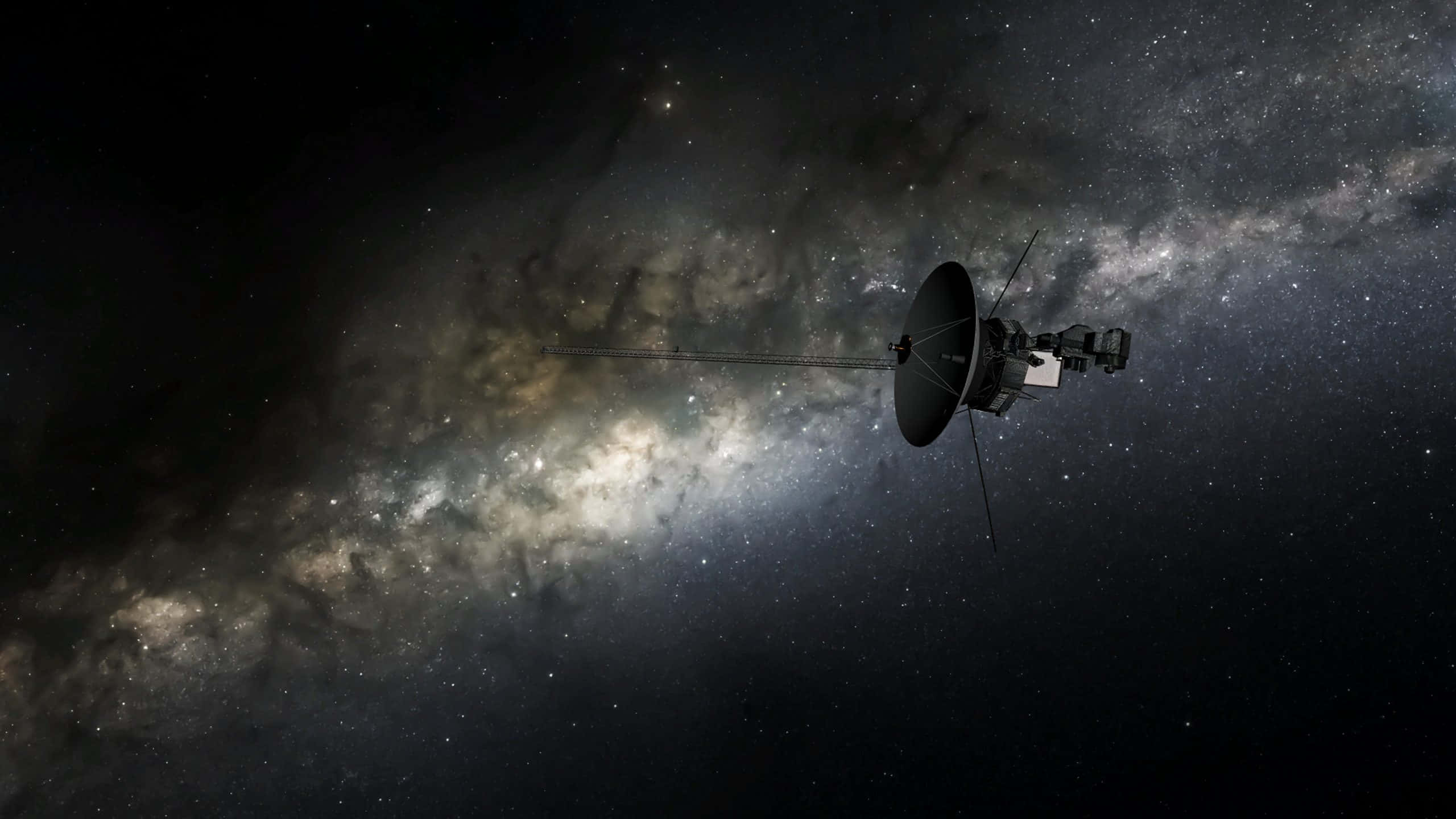 太空 桌布 壁紙 — 一艘細節豐富的太空船在銀河系中漂流，背景是星星和宇宙塵埃。