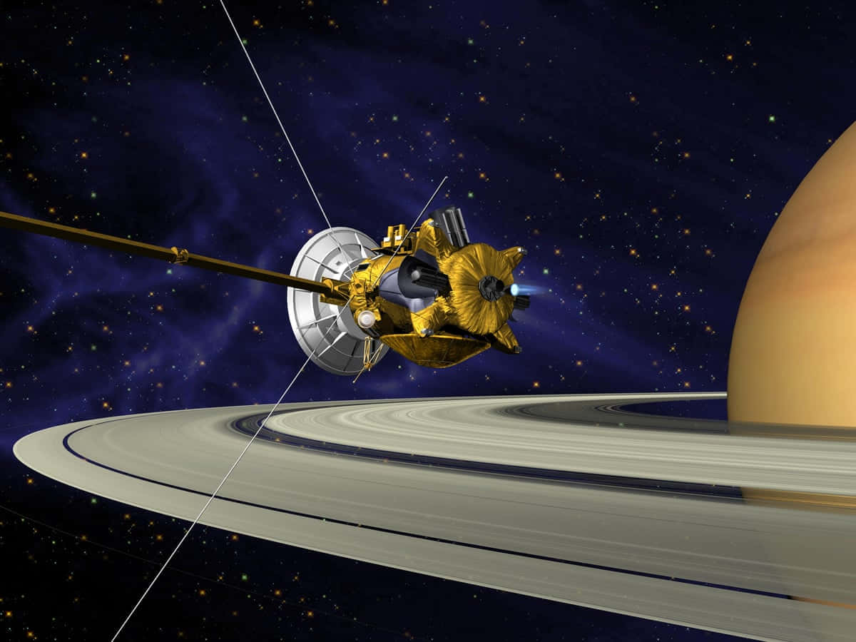 土星 桌布 壁紙 — 一艘金色太空船在繁星點點的宇宙背景下滑過土星的標誌性光環。