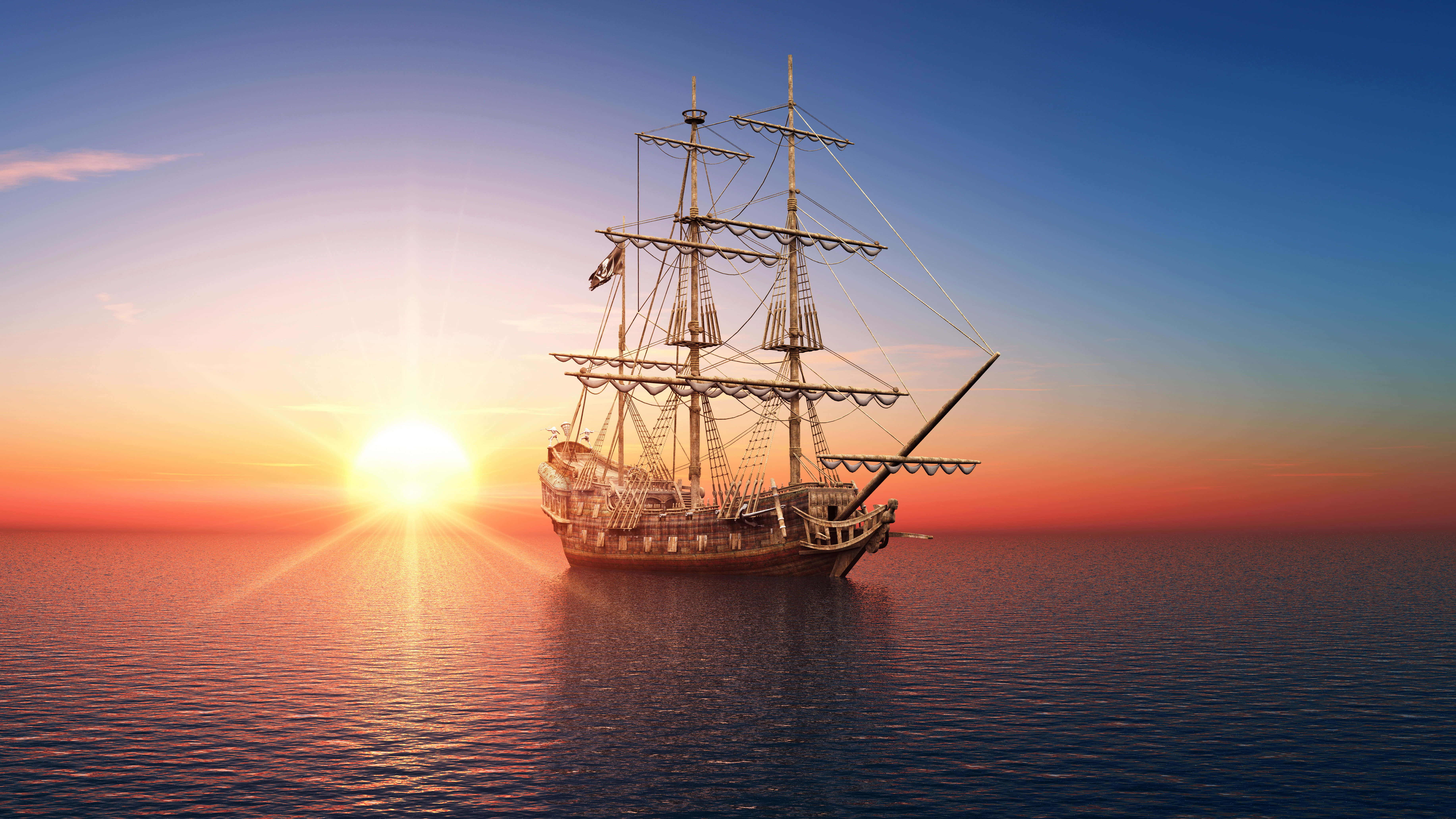 Sailboat 桌布 壁紙 — 一艘雄偉的高桅帆船在平靜的海洋水域上平穩航行，太陽在橙色和藍色的火焰中落下。