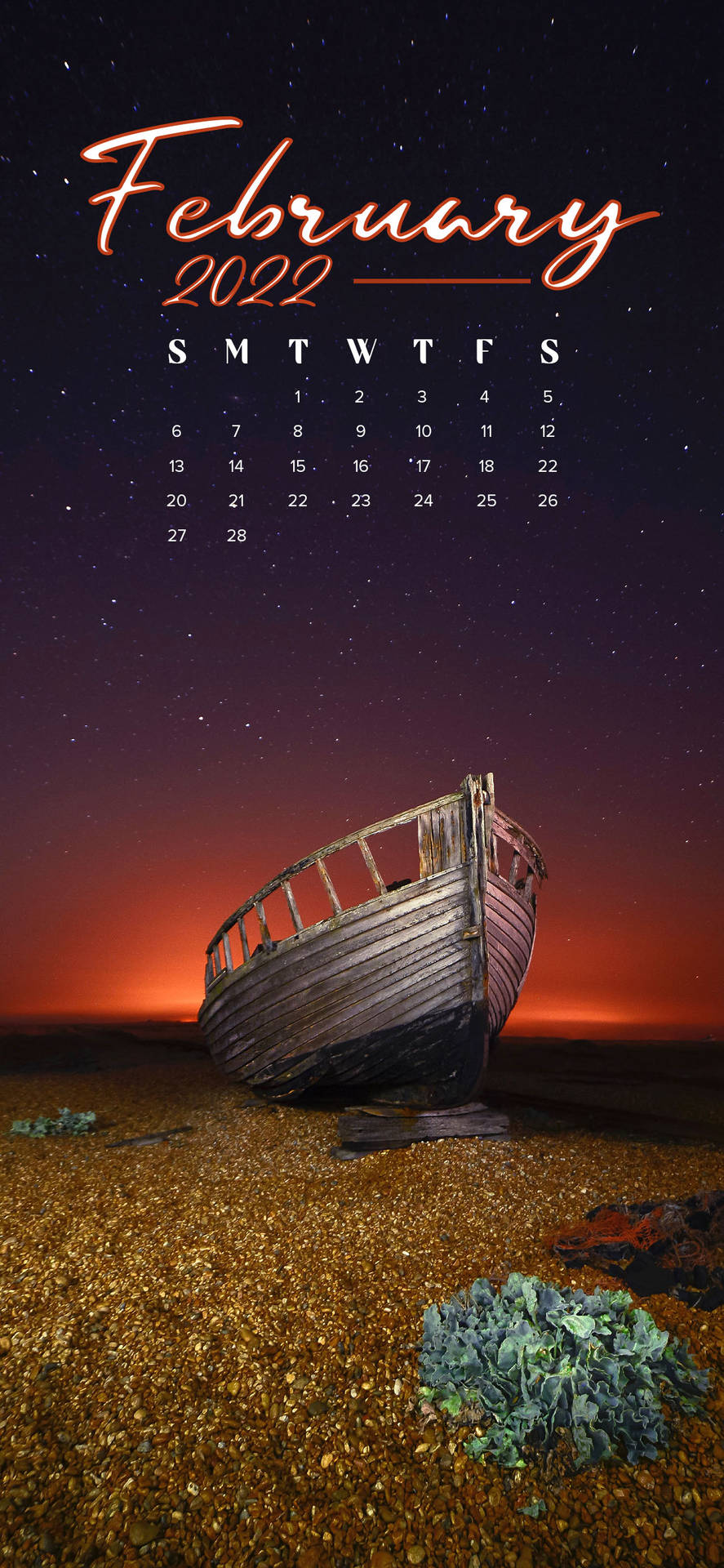 廢棄的木船停在卵石海灘上，上方是繁星點點的暮色天空，帶有日曆疊加。 — 二月 GIF 壁紙