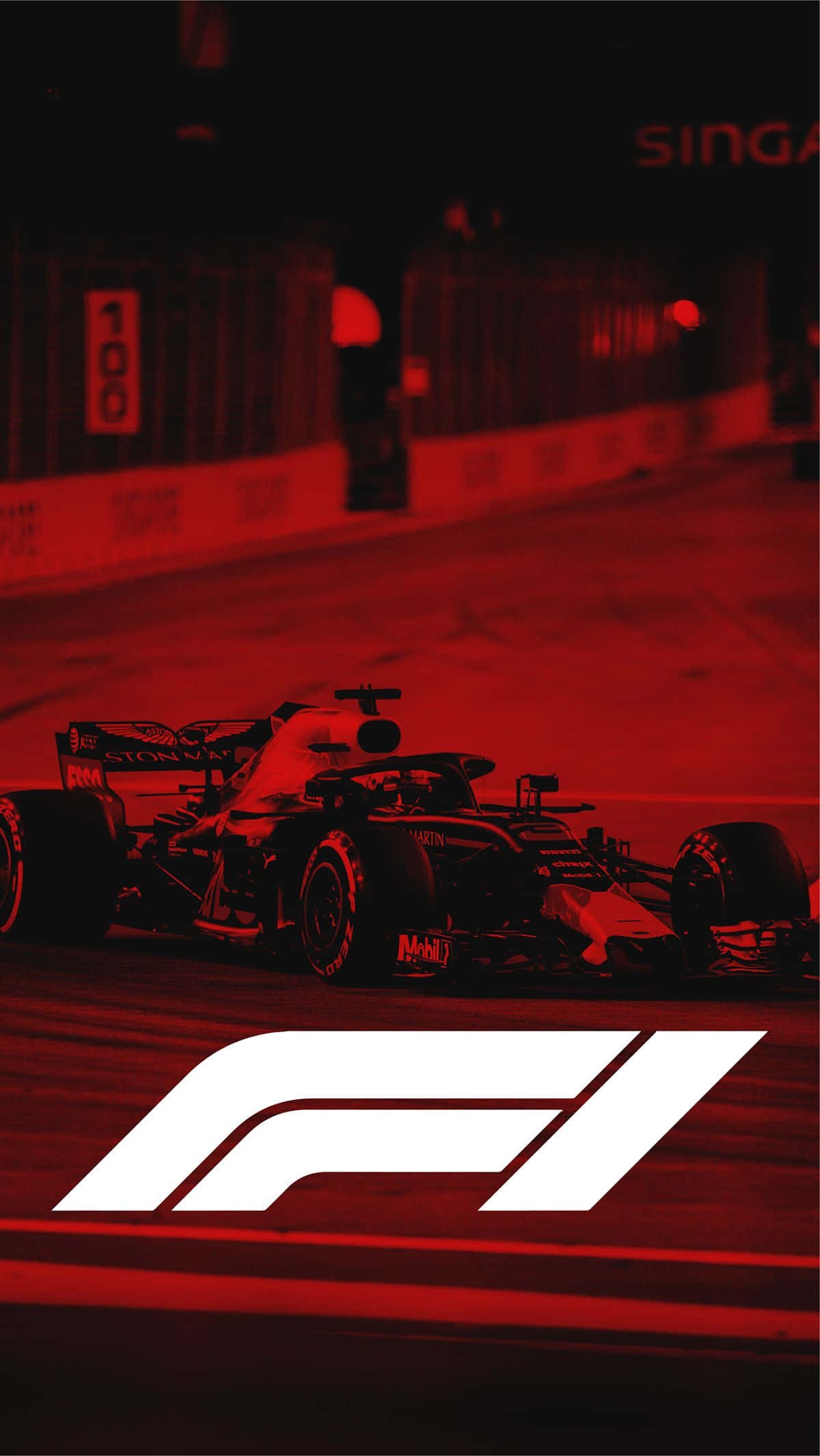 Formula 1 iPhone 桌布 壁紙 — 一輛一級方程式賽車在紅光照亮的夜間賽道上飛馳，F1標誌清晰可見。