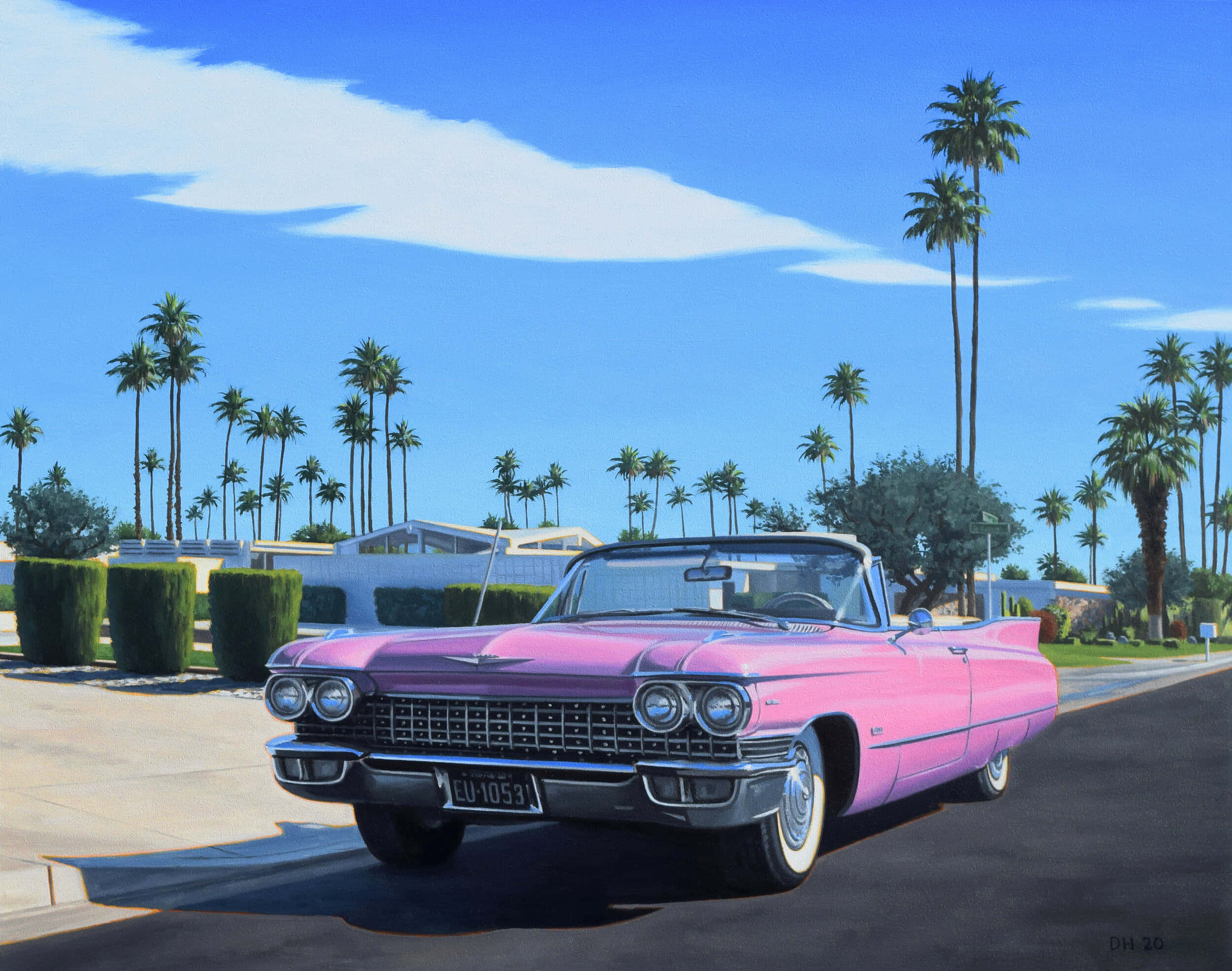 Pink Cadillac 桌布 壁紙 — 一輛亮粉紅色的1959年凱迪拉克敞篷車停在一條陽光普照的街道上，街道兩旁種滿棕櫚樹和中世紀房屋。