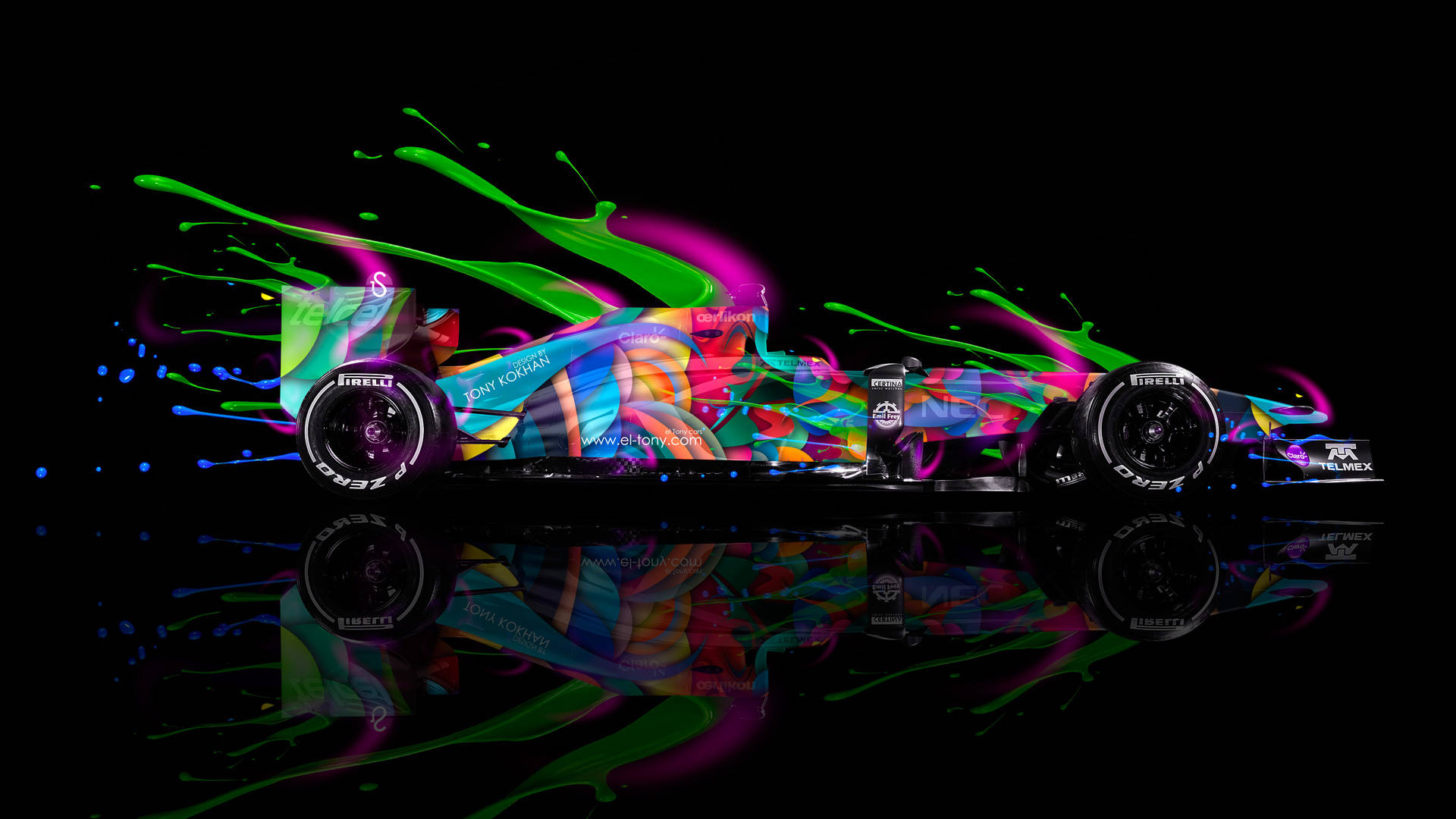Formula 1 Desktop 桌布 壁紙 — 一輛充滿活力的F1賽車在黑色反光表面上爆發出霓虹顏料飛濺。
