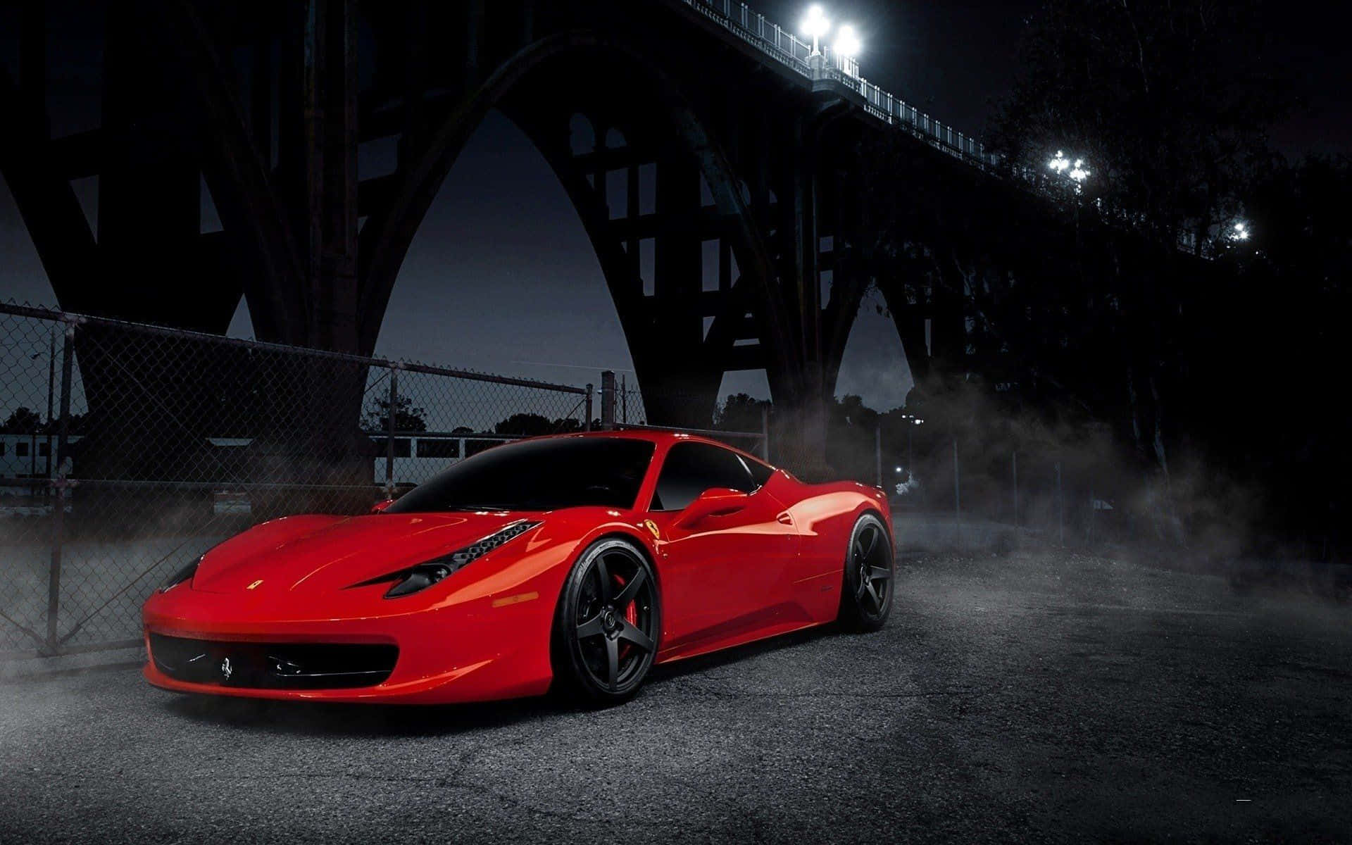 Ferrari 458 Speciale 桌布 壁紙 — 一輛充滿活力的紅色法拉利跑車在夜間黑暗的橋下飄移，輪胎周圍煙霧繚繞。