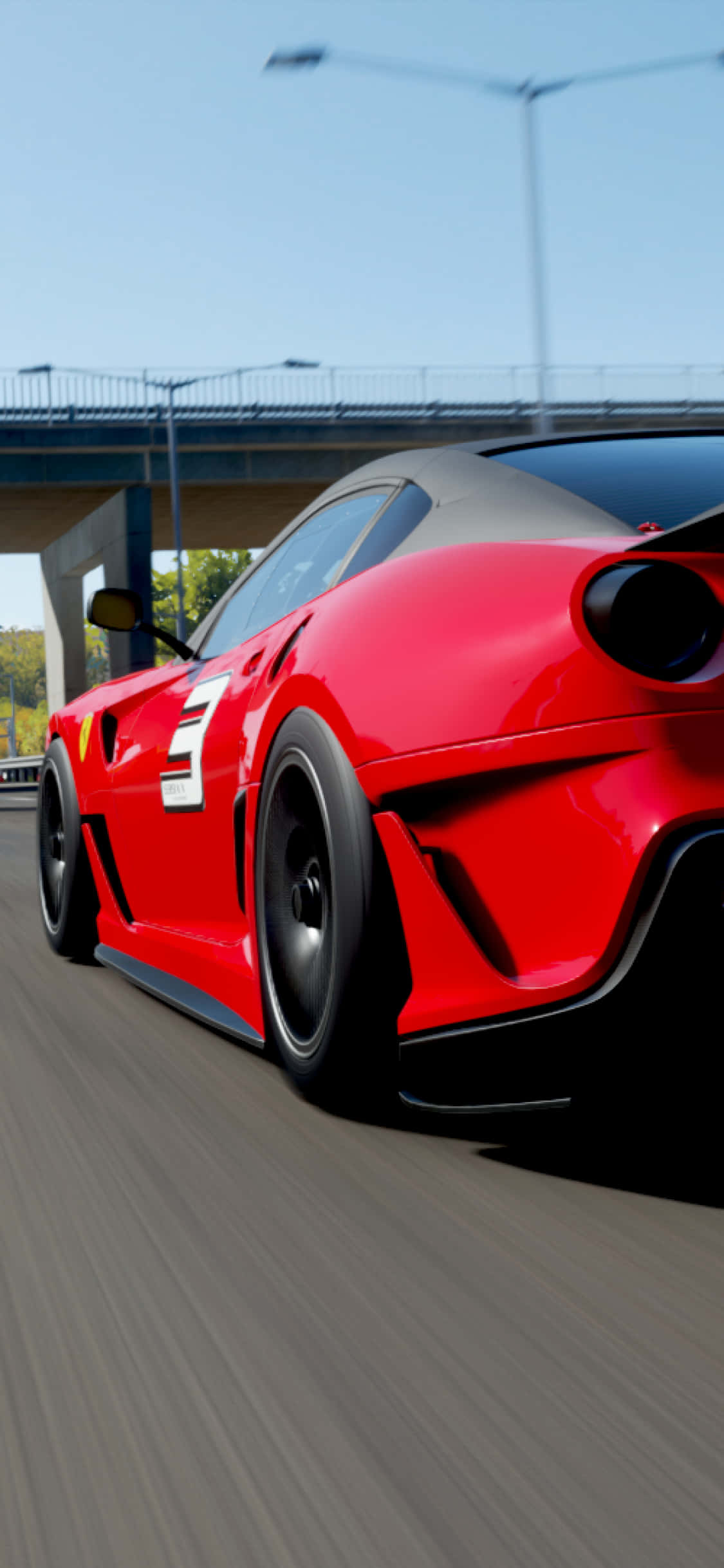 iPhone X Forza Horizon 4 桌布 壁紙 — 一輛充滿活力的紅色法拉利跑車在瀝青路上帶著動態模糊效果，在混凝土高架橋下飛馳。