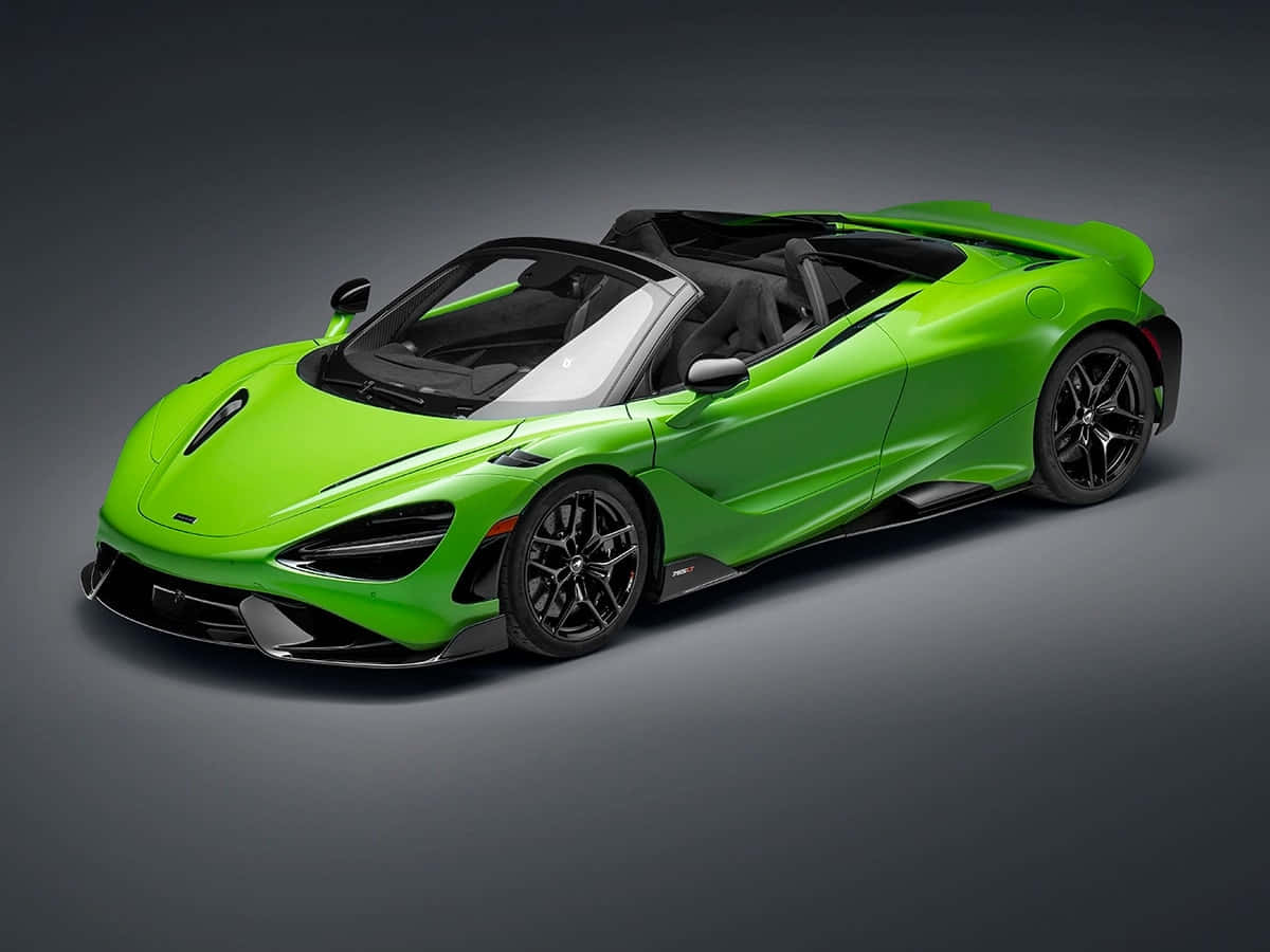 麥拉倫 桌布 壁紙 — 一輛充滿活力的萊姆綠色McLaren 720S Spider敞篷跑車，帶有黑色飾件和敞開車頂，在工作室環境中展示。