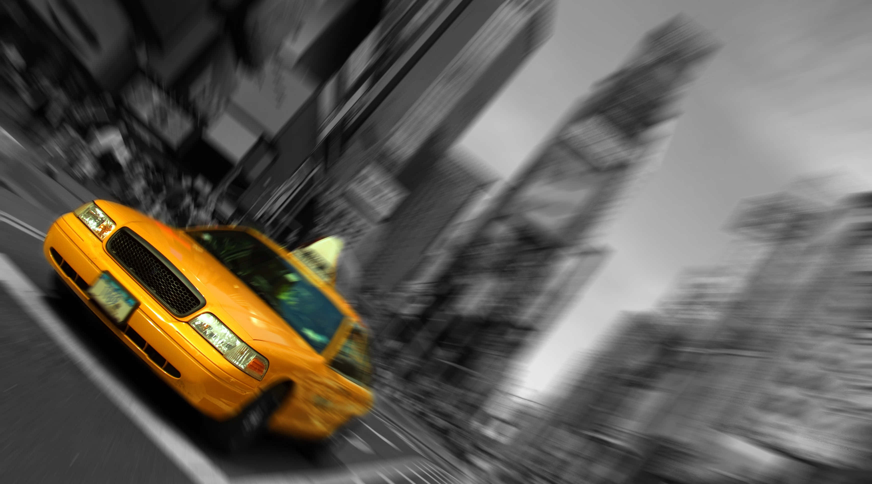 taxi 桌布 壁紙 — 一輛充滿活力的黃色計程車在模糊的城市街道上疾馳，營造出動態的運動感和城市能量。