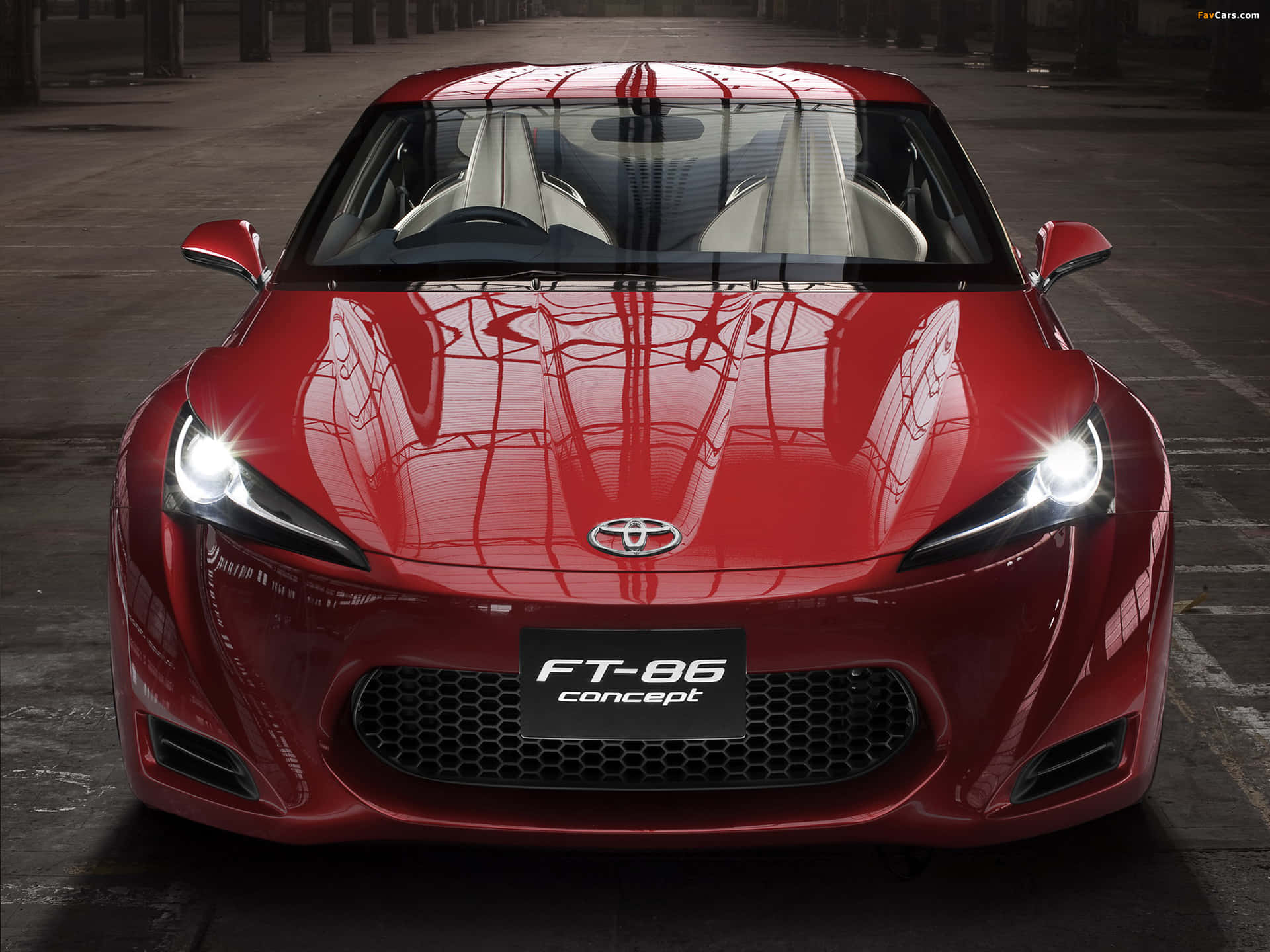紅色豐田FT-86概念車在黑暗車庫中車頭燈發光。 — Toyota Supra Mk4 壁紙