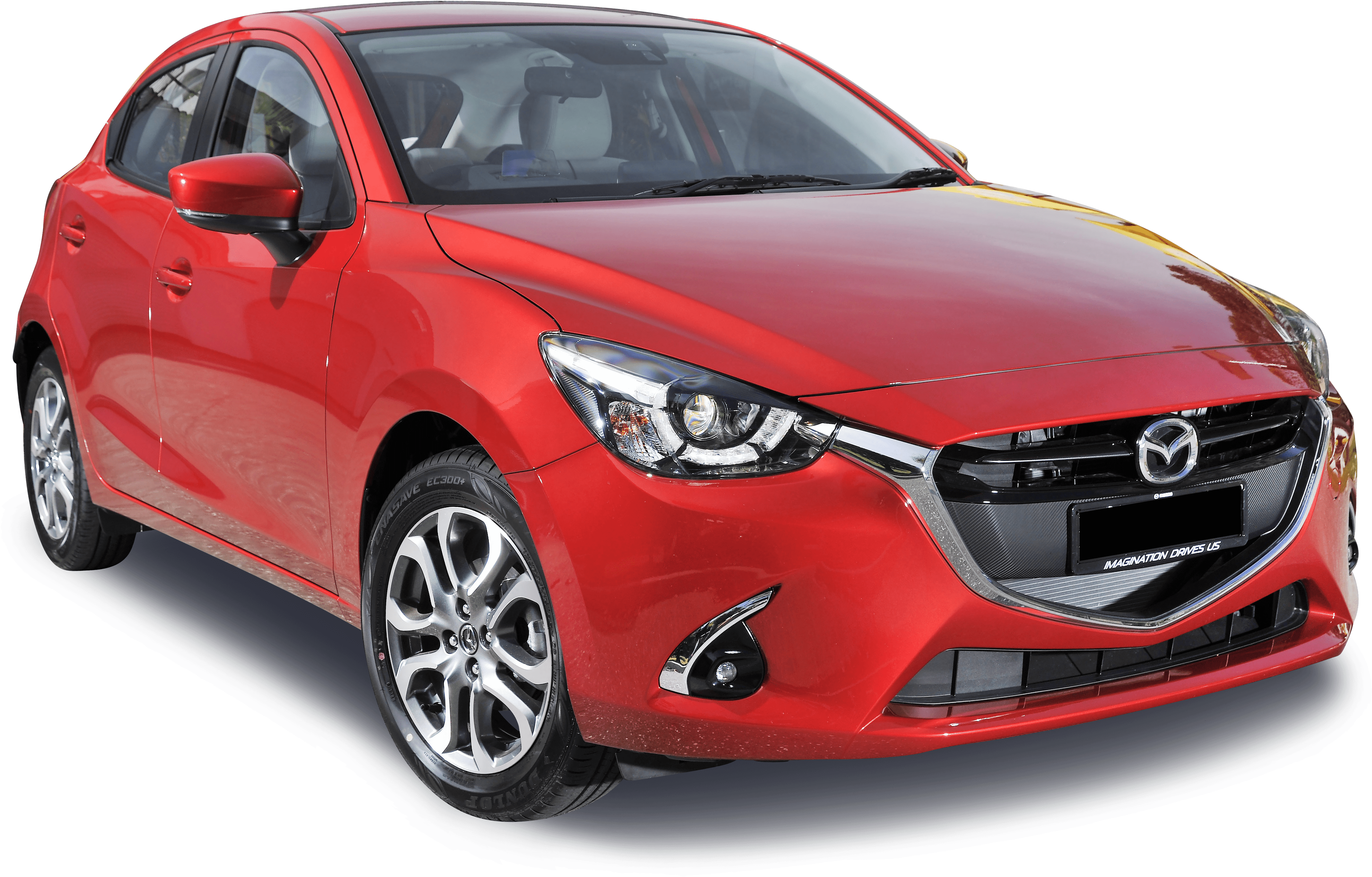 馬自達 桌布 壁紙 — 一輛光澤的紅色Mazda 2掀背車在攝影棚燈光下展示，下方有深藍色陰影。