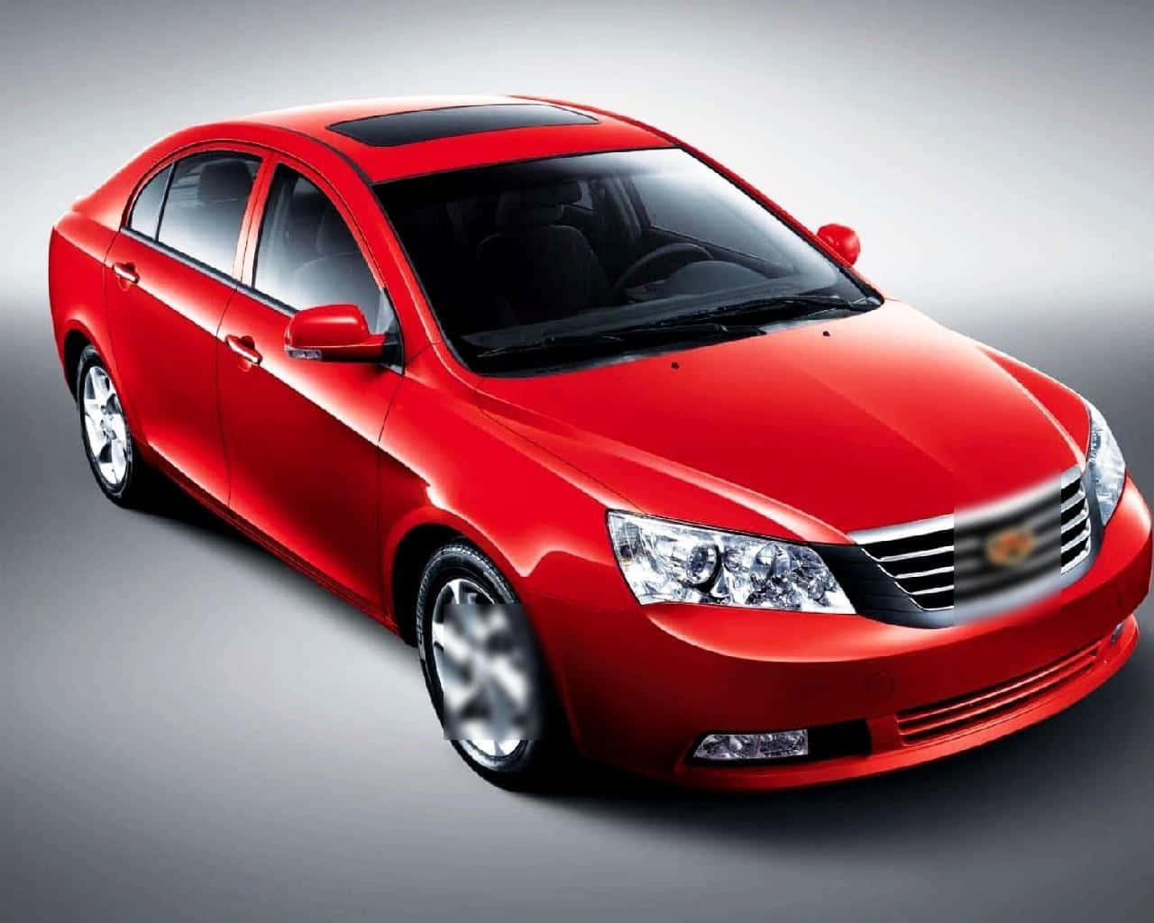 Geely 桌布 壁紙 — 一輛光澤的紅色轎車，線條流暢，帶有鍍鉻裝飾，在灰色中性工作室背景前展示。