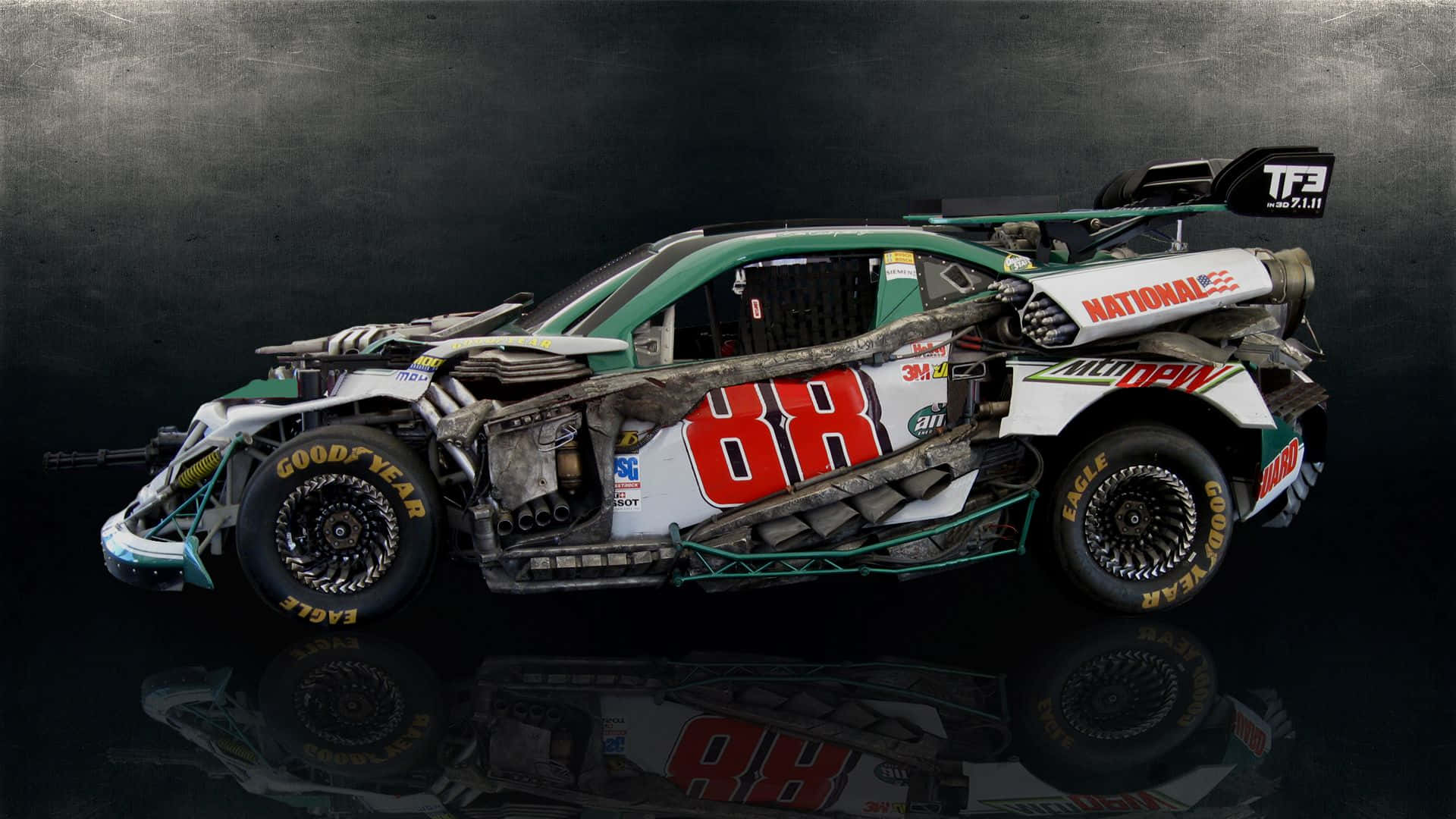 nascar 桌布 壁紙 — 一輛嚴重損毀的賽車，車號88，帶有贊助商標誌，停放在反射黑色表面上，背景為深色紋理。