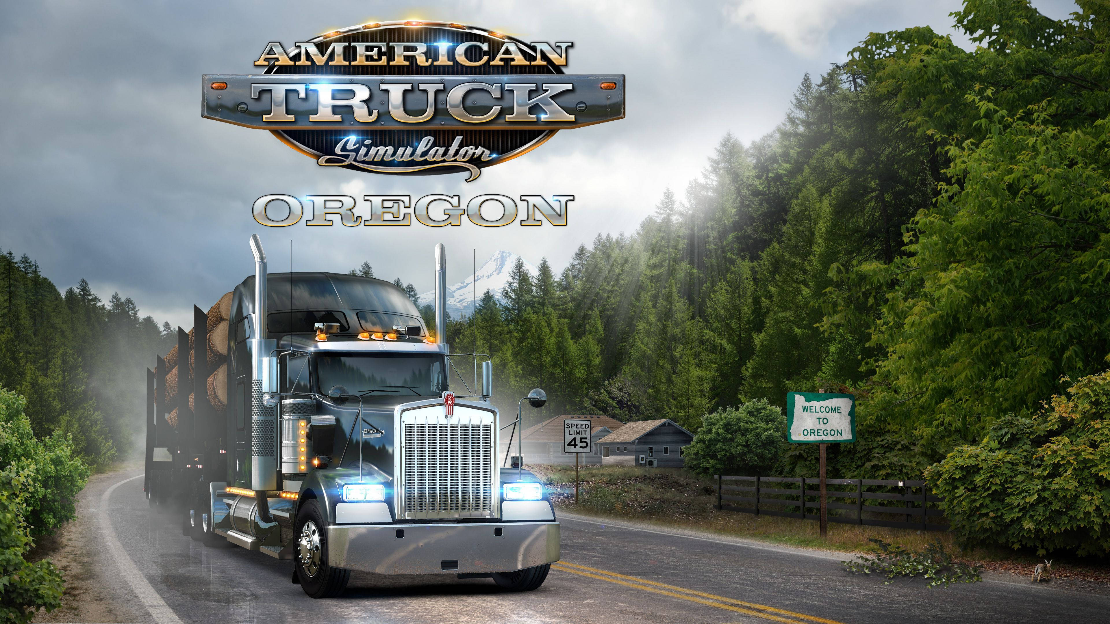 American Truck Simulator 桌布 壁紙 — 一輛大型銀色半掛卡車在潮濕的道路上行駛，穿過茂密的綠色森林，有『歡迎來到俄勒岡』標誌和遠處的山脈，天空多雲。