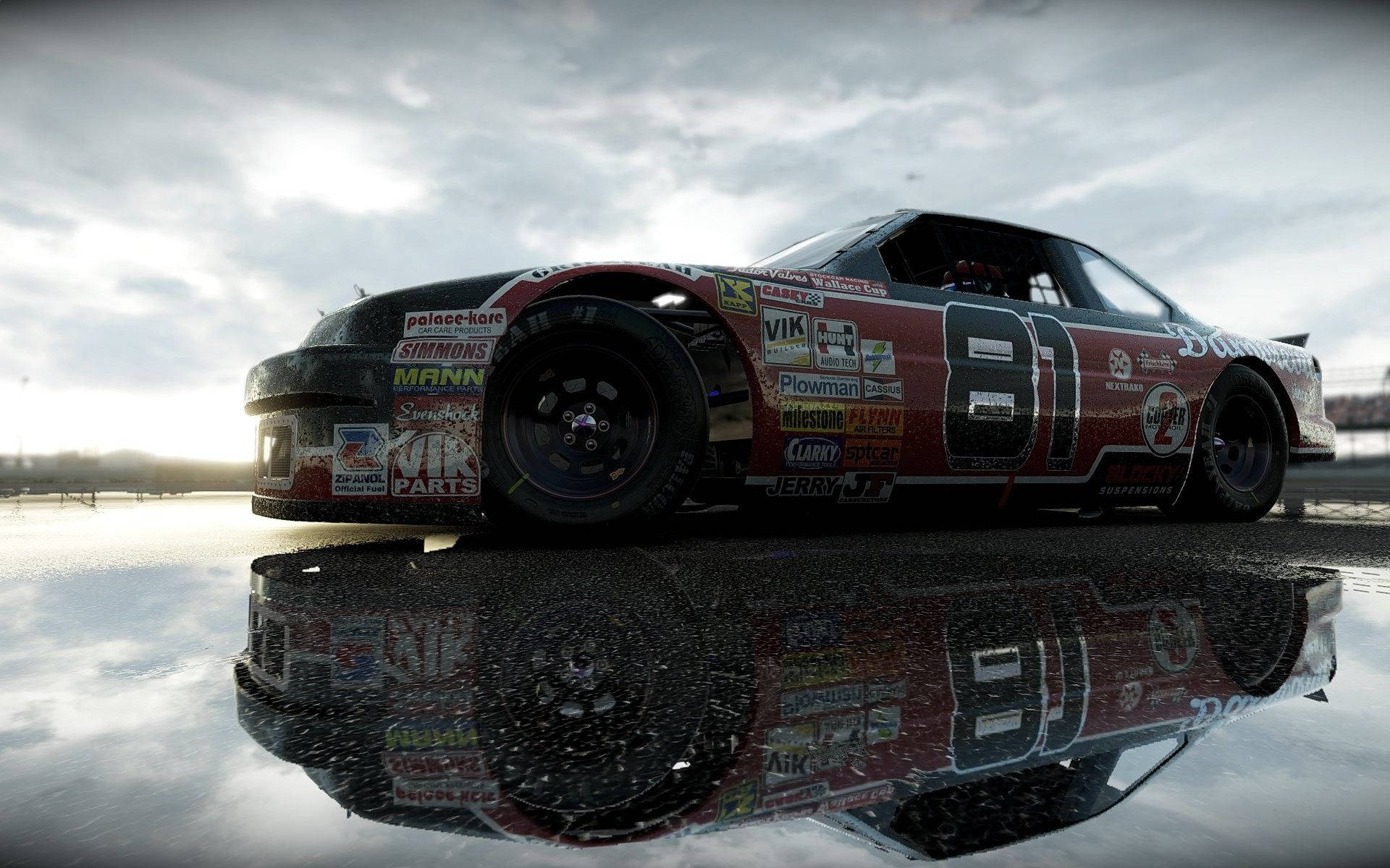 紅色賽車81號停在潮濕賽道上，在黃昏時分的水坑中反射。 — Project Cars 壁紙