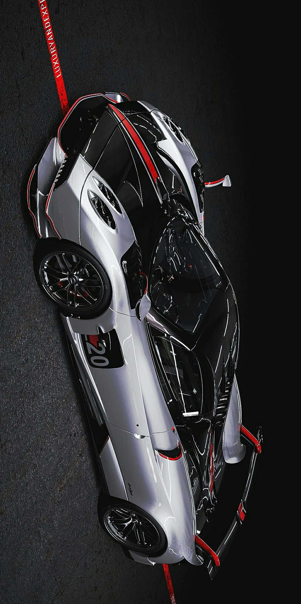 Pagani Zonda C12 Roadster 桌布 壁紙 — 一輛帶有紅色點綴的時尚銀黑雙色跑車，從上方俯瞰，背景為深色紋理表面。