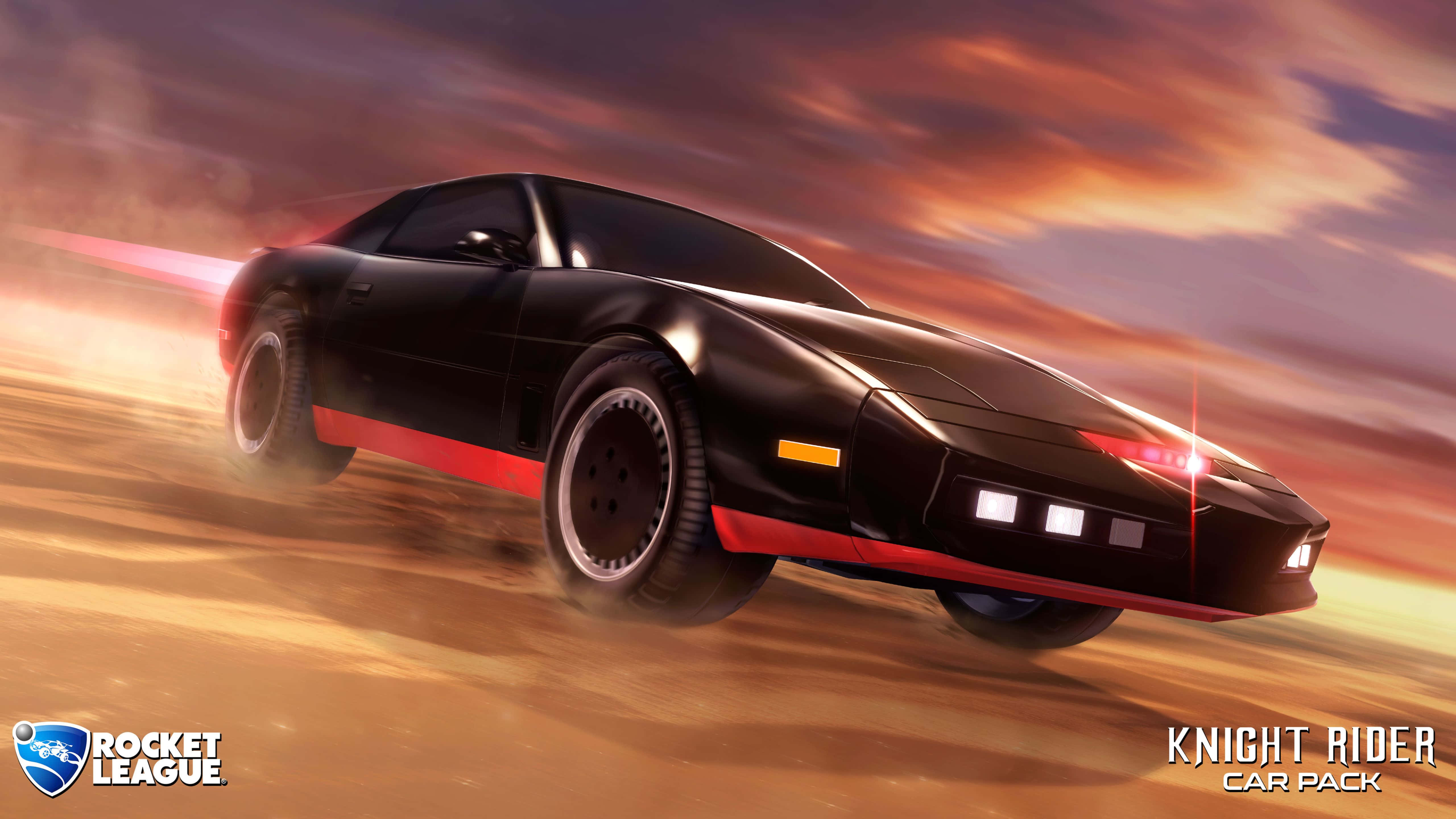 Best Rocket League 桌布 壁紙 — 一輛帶有紅色點綴的黑色Knight Rider汽車在熾熱的日落天空下穿越沙漠。