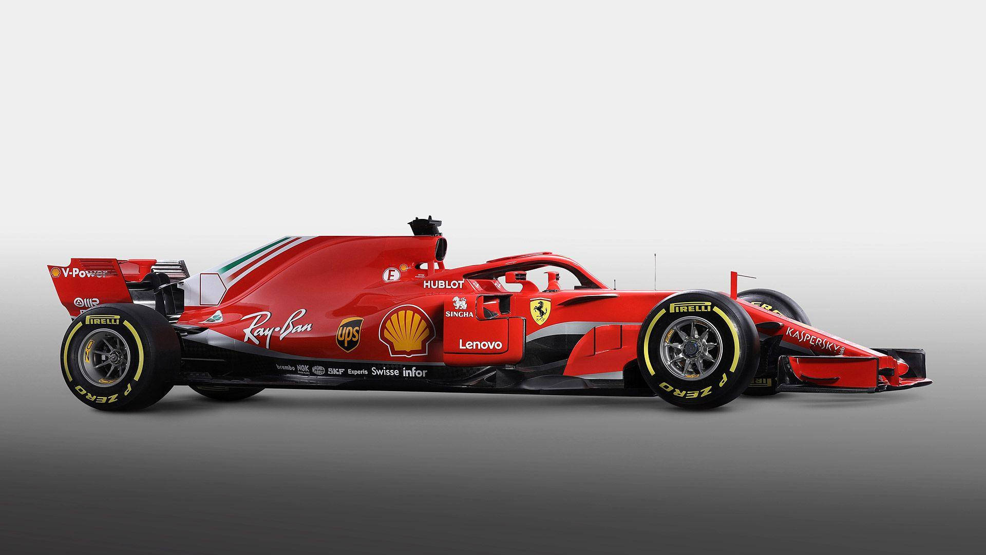 Formula One 桌布 壁紙 — 一輛帶有贊助商標誌的時尚紅色法拉利一級方程式賽車，在漸變灰色背景上以側面輪廓展示。