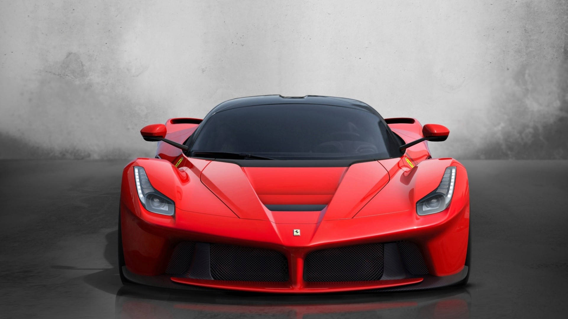1920x1080 Ferrari 桌布 壁紙 — 一輛引人注目的紅色法拉利LaFerrari在灰色混凝土牆壁和地板的極簡工作室中正面朝前。