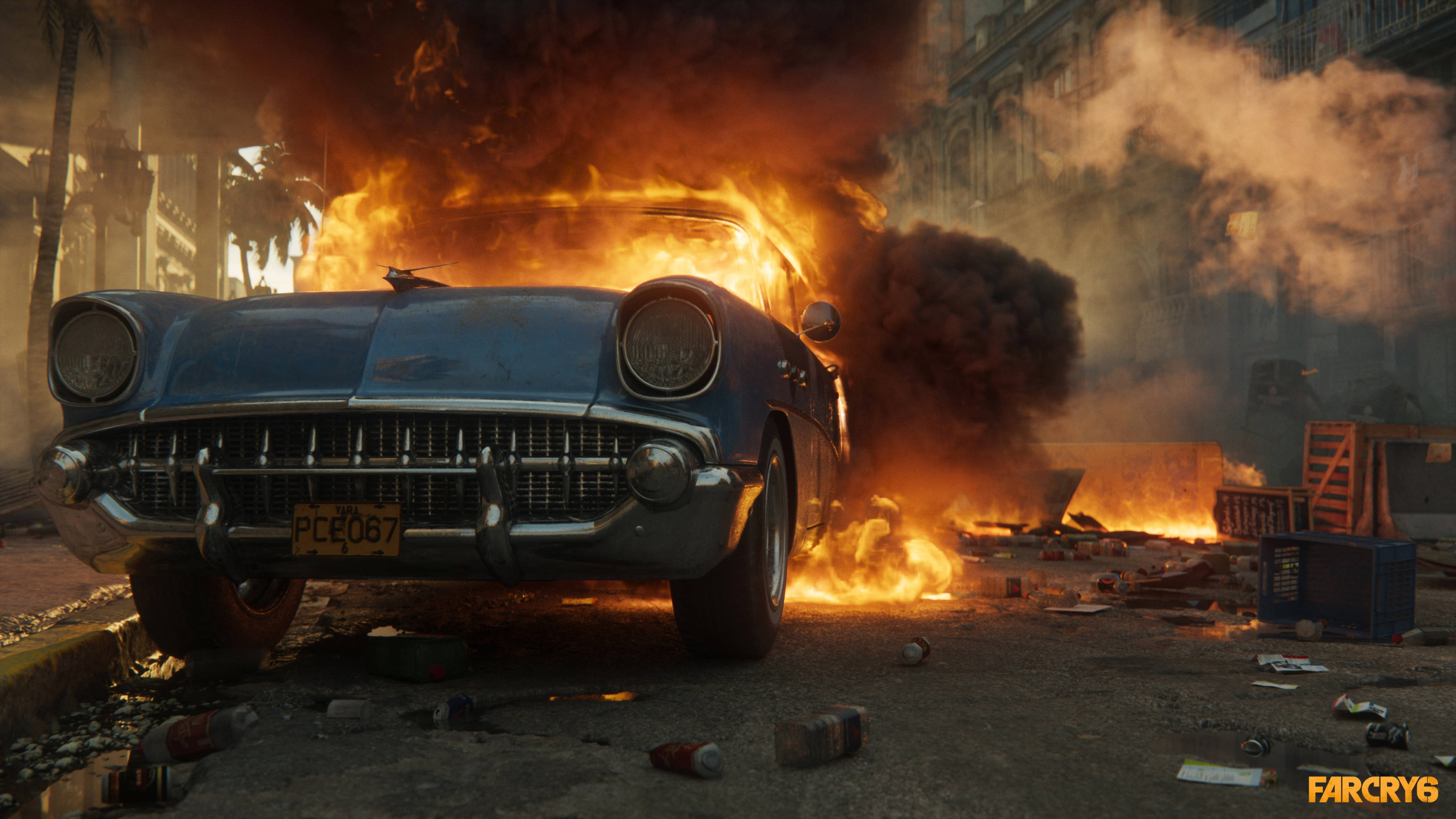 極地戰嚎 6 桌布 壁紙 — 一輛復古藍色汽車在充滿碎片和煙霧的混亂城市街道上猛烈燃燒。
