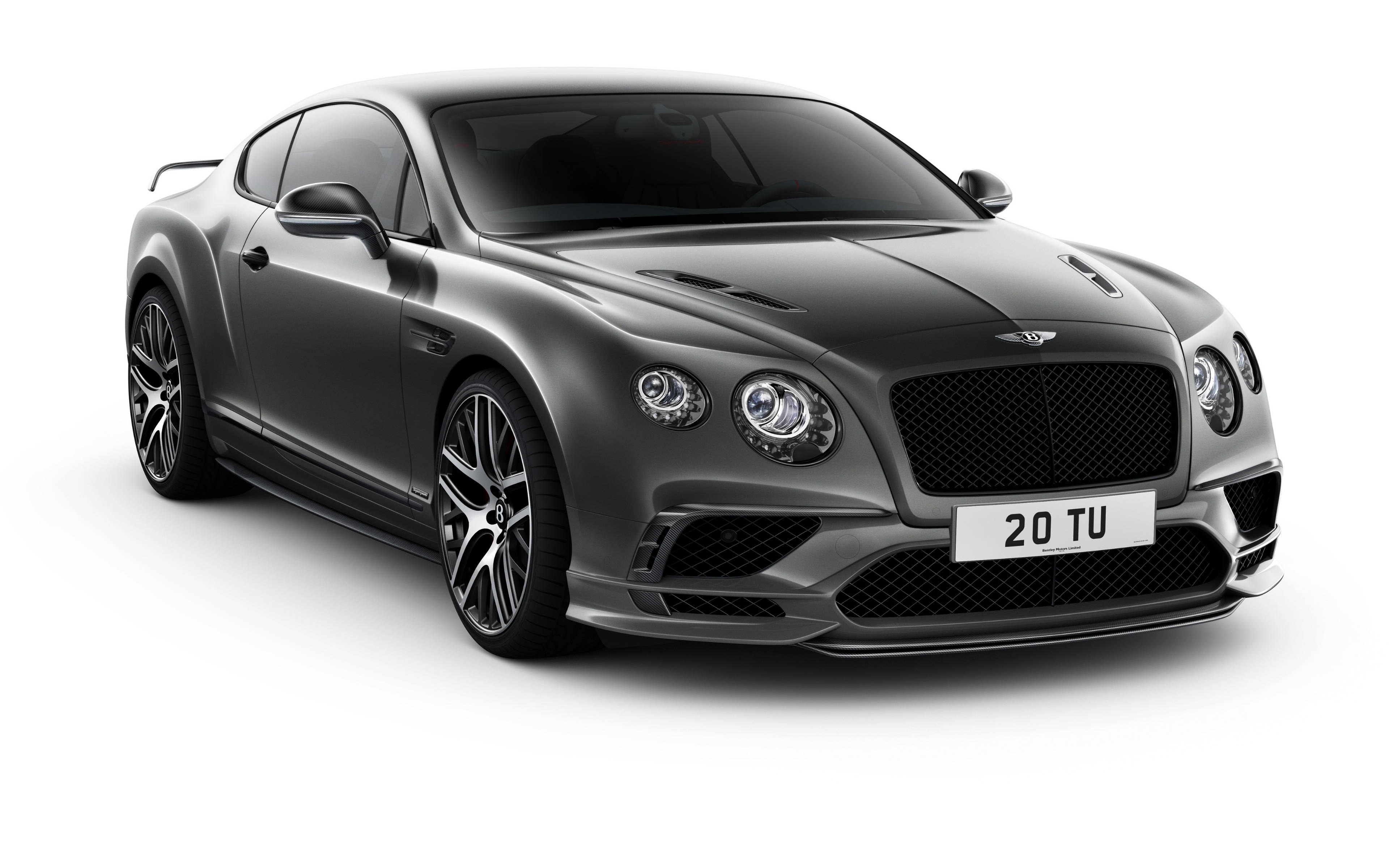 bentley HD 桌布 壁紙 — 一輛時尚的啞光灰色賓利 Continental GT Speed 雙門轎跑車，在攝影棚燈光下以潔白背景展示。