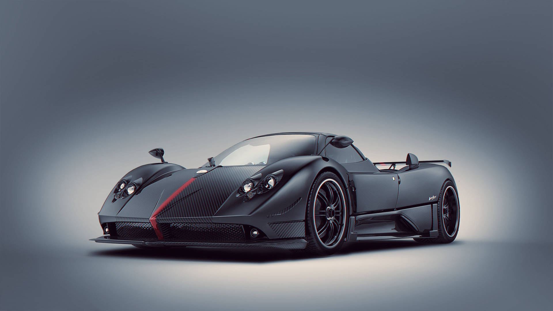 Pagani 桌布 壁紙 — 一輛時尚的啞光黑色帕加尼Zonda跑車，帶有紅色飾條，在漸變灰色背景下的攝影棚燈光中閃耀。
