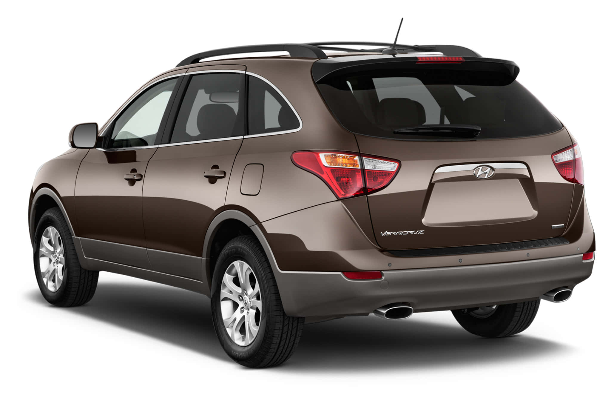 Hyundai Veracruz 桌布 壁紙 — 一輛時尚的棕色現代Veracruz SUV，從後方四分之三角度展示在乾淨的白色背景上。