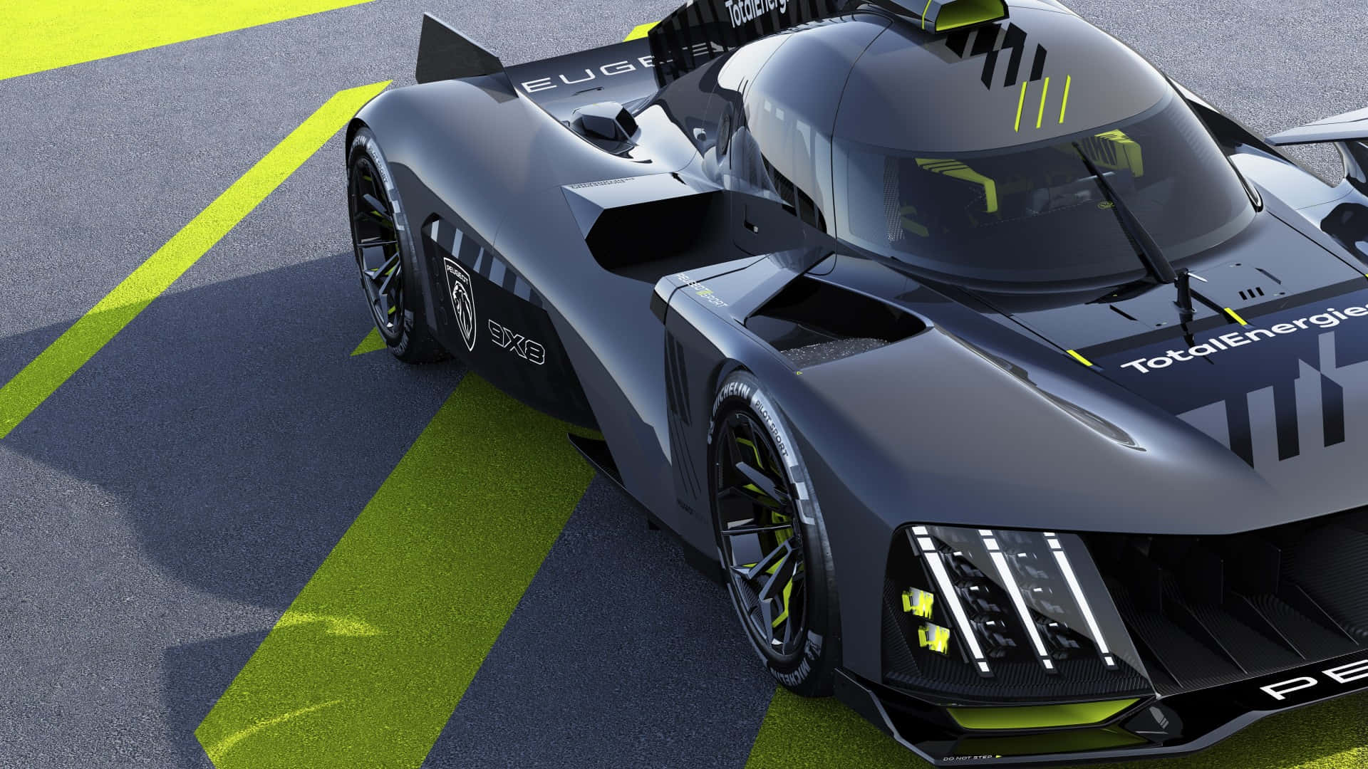 1920x1080 Project Cars 桌布 壁紙 — 一輛時尚的深灰色賽車帶有霓虹黃色點綴，停在以鮮明黃色條紋標記的賽道上。
