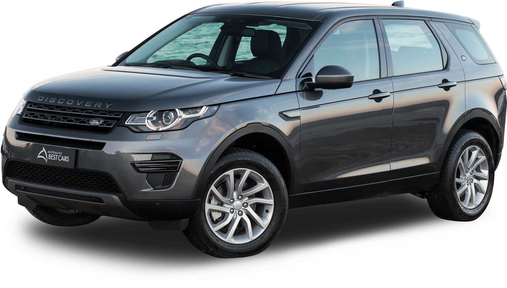 荒原路華 桌布 壁紙 — 一輛時尚的灰色 Land Rover Discovery SUV 在透明背景上展示，工作室燈光凸顯其現代設計和合金輪圈。