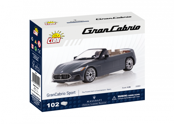 瑪莎拉蒂 桌布 壁紙 — 一輛時尚的灰色Maserati GranCabrio Sport模型車，放在帶有藍白品牌的Cobi建築套件盒中。