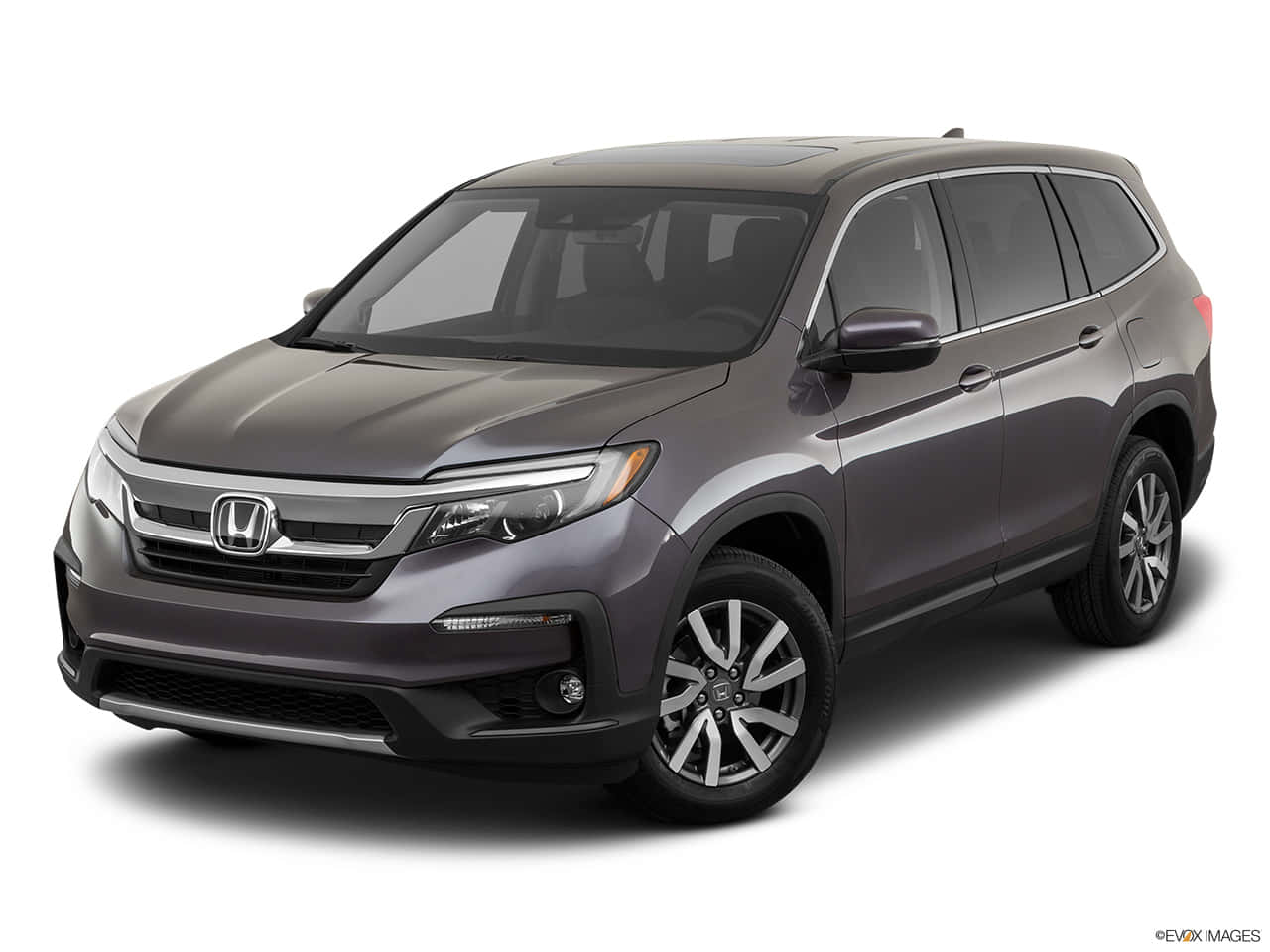 Honda Pilot 桌布 壁紙 — 一輛時尚的灰色本田Pilot SUV在攝影棚燈光下，以潔白背景展示。