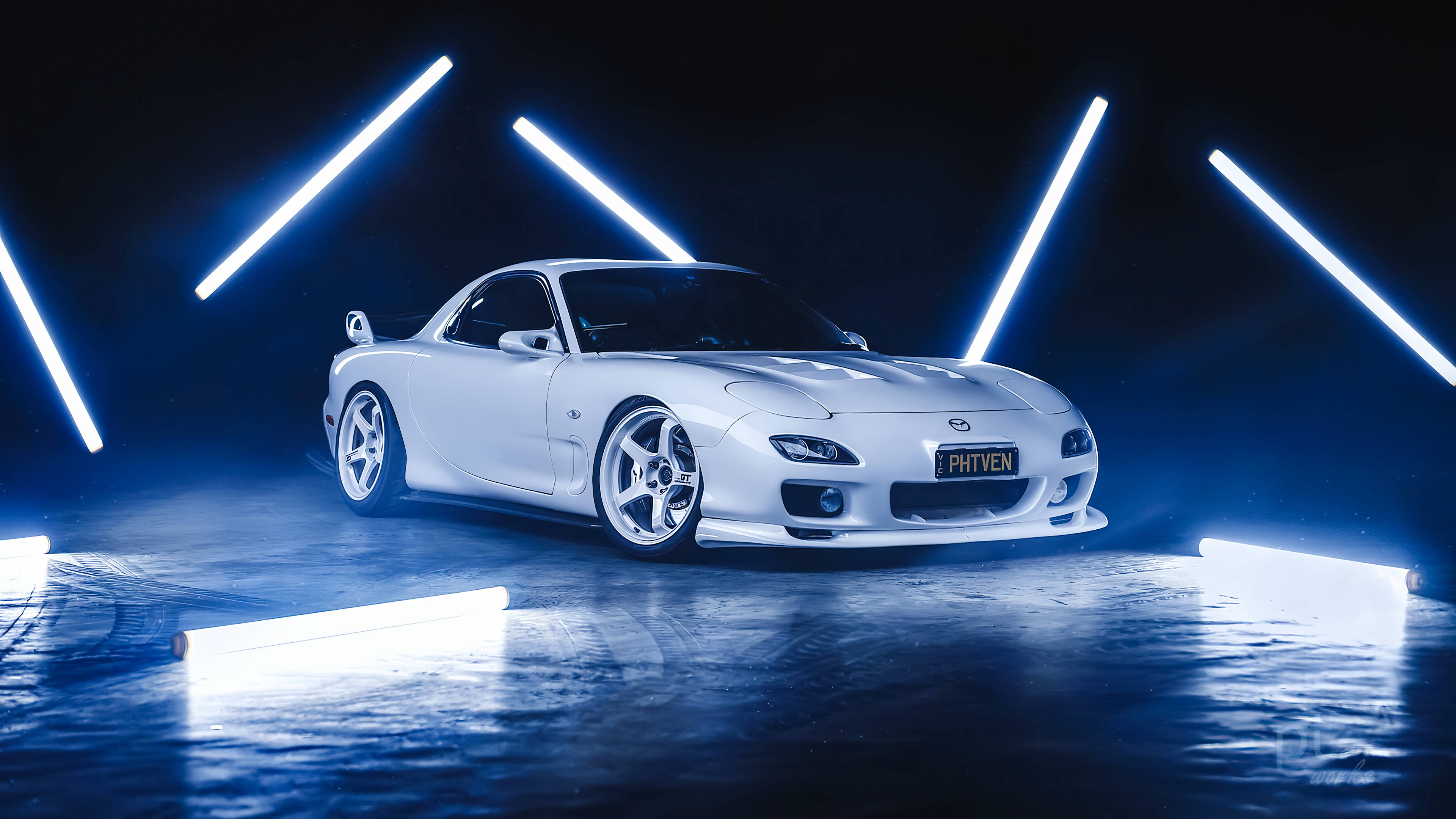 Mazda 桌布 壁紙 — 一輛時尚的白色跑車在黑暗的攝影棚中，在戲劇性的藍色霓虹燈下閃耀。