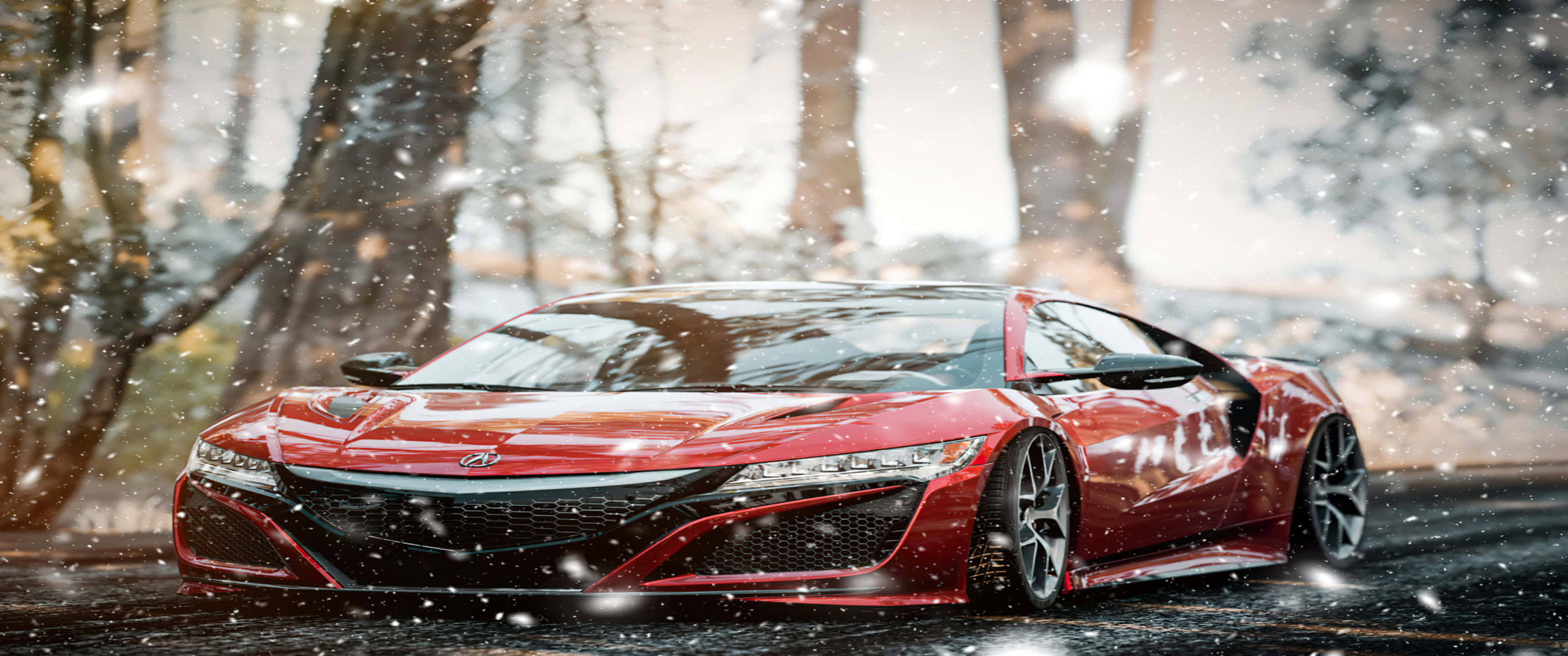 Acura 桌布 壁紙 — 一輛時尚的紅色跑車在飄落的雪花下閃閃發光，駛過一片樹木光禿的冬日森林。