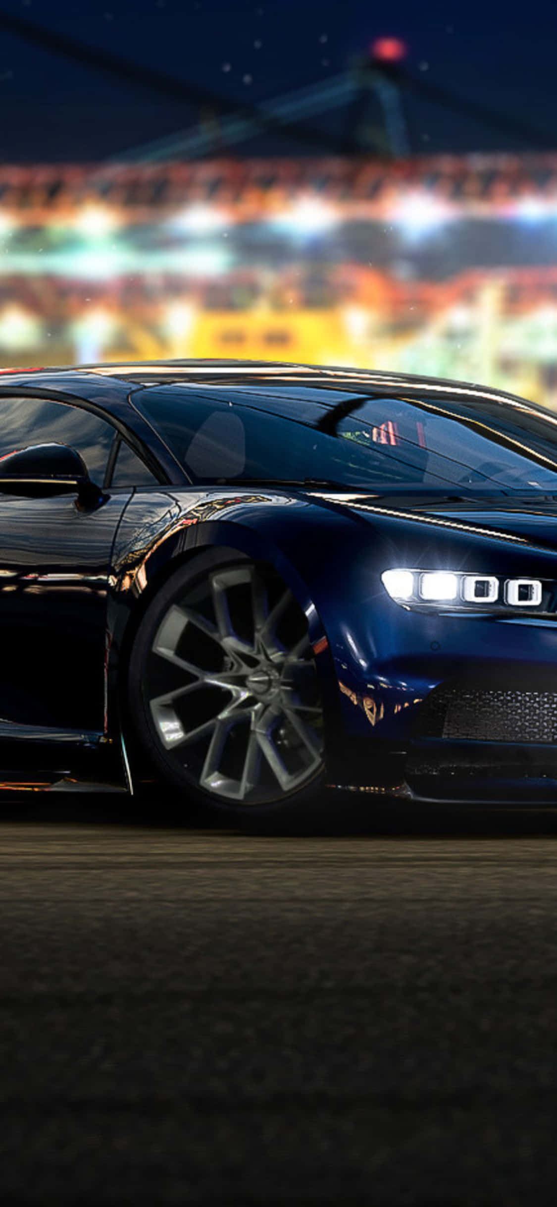 Forza Gaming 桌布 壁紙 — 一輛時尚的藍色跑車在充滿活力的夜間城市景觀中，在霓虹燈下閃耀。