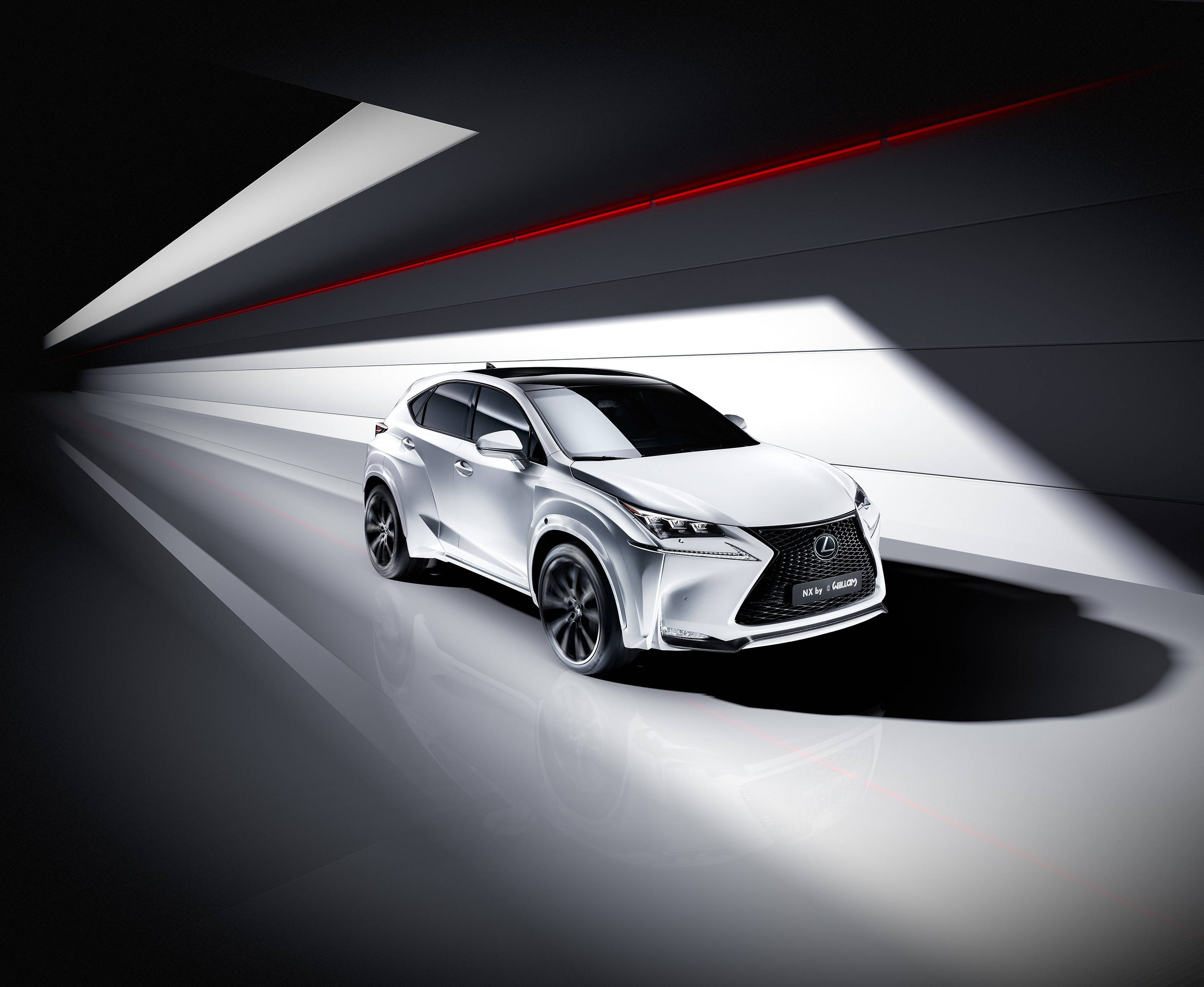 lexus iPhone 桌布 壁紙 — 一輛時尚的銀色Lexus NX SUV在由銳利白色和紅色光束照亮的未來感隧道中滑行。