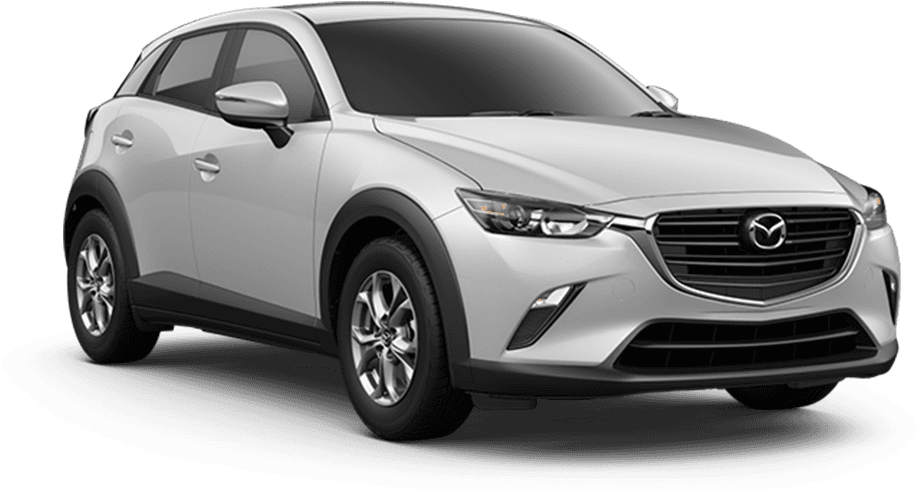 馬自達 桌布 壁紙 — 一輛時尚的銀色Mazda CX-3 SUV在純黑色背景上展示，工作室燈光突出其現代曲線和合金輪圈。