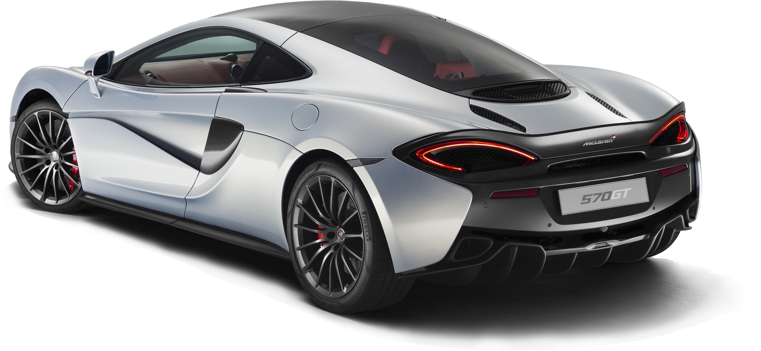 麥拉倫 桌布 壁紙 — 一輛時尚的銀色McLaren 570ST跑車，從後方四分之三角度拍攝，帶有發光的紅色尾燈和黑色輪圈。