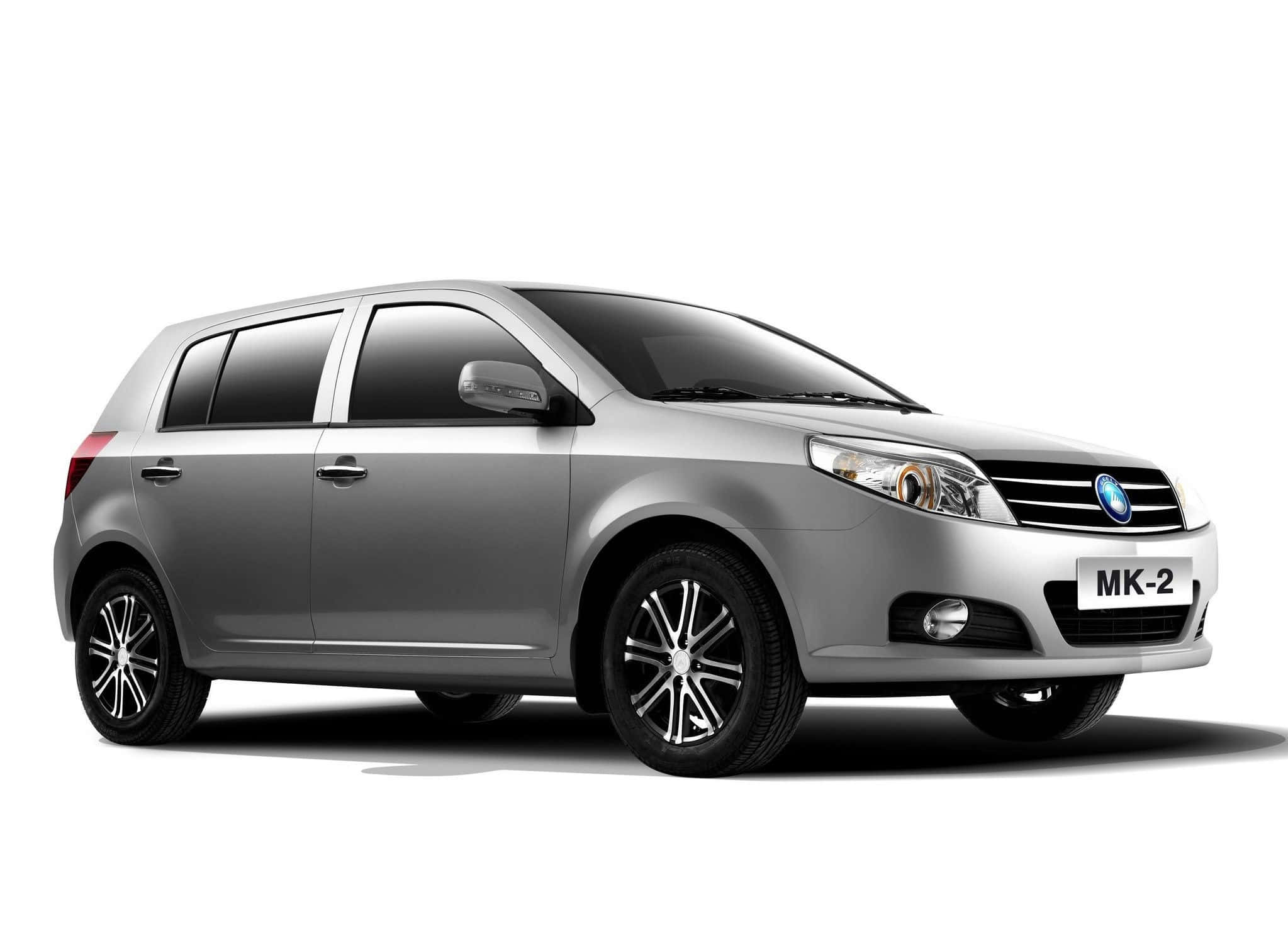 Geely 桌布 壁紙 — 一輛時尚的銀色MK-2掀背車在工作室燈光下以純白色背景展示。