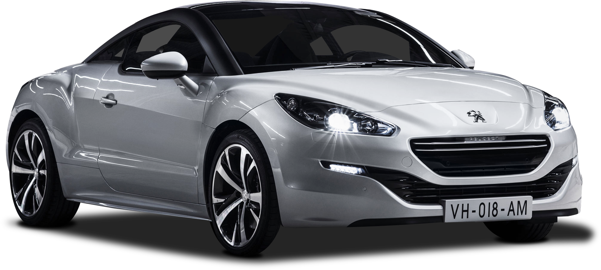 標緻 桌布 壁紙 — 一輛時尚的銀色Peugeot RCZ跑車，帶有發光頭燈和黑色飾邊，在純黑色背景下脫穎而出。