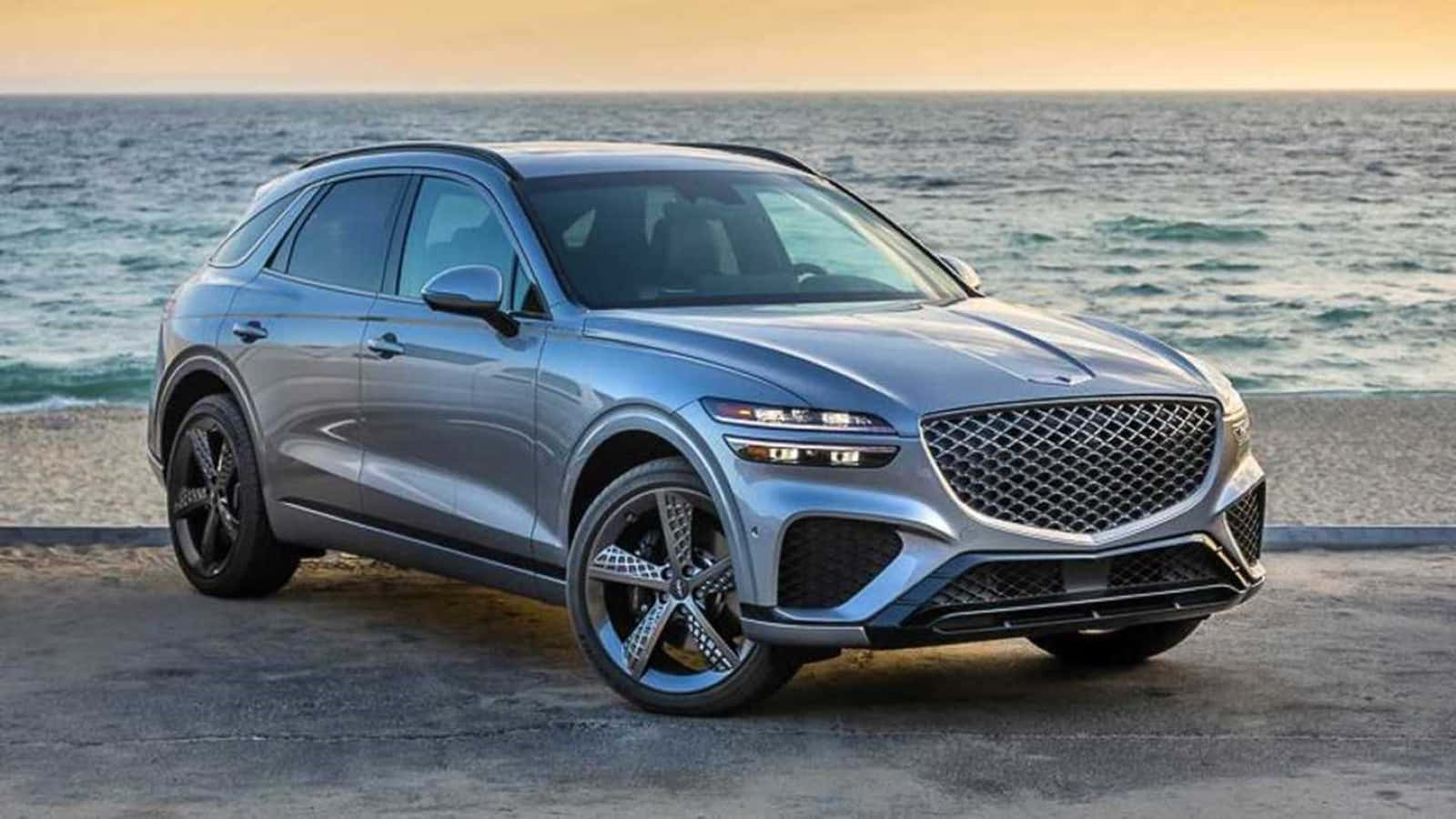 日落時分，海邊停泊的銀色豪華SUV。 — Toyota Supra Mk4 壁紙