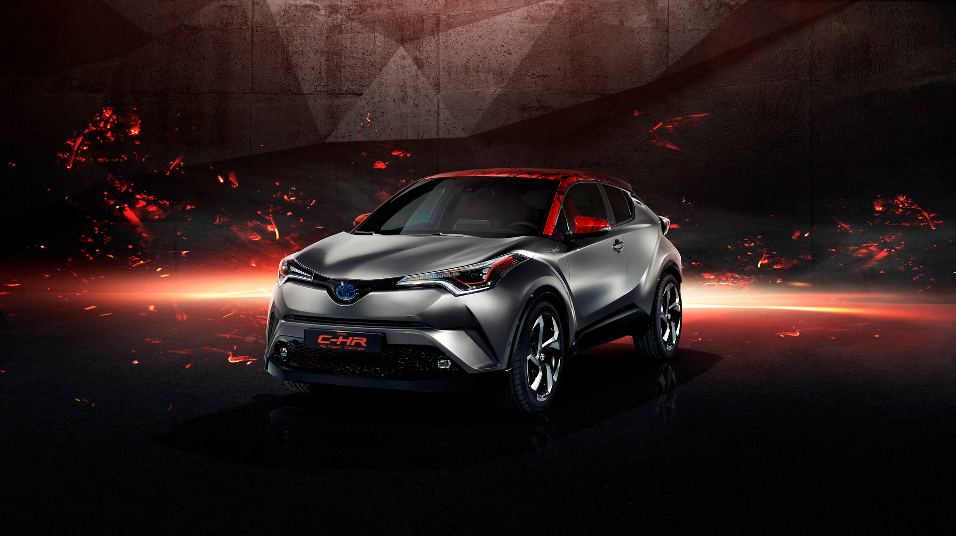 銀色豐田C-HR SUV在黑暗的工業場景中被紅色火花包圍。 — Toyota Supra Mk4 壁紙