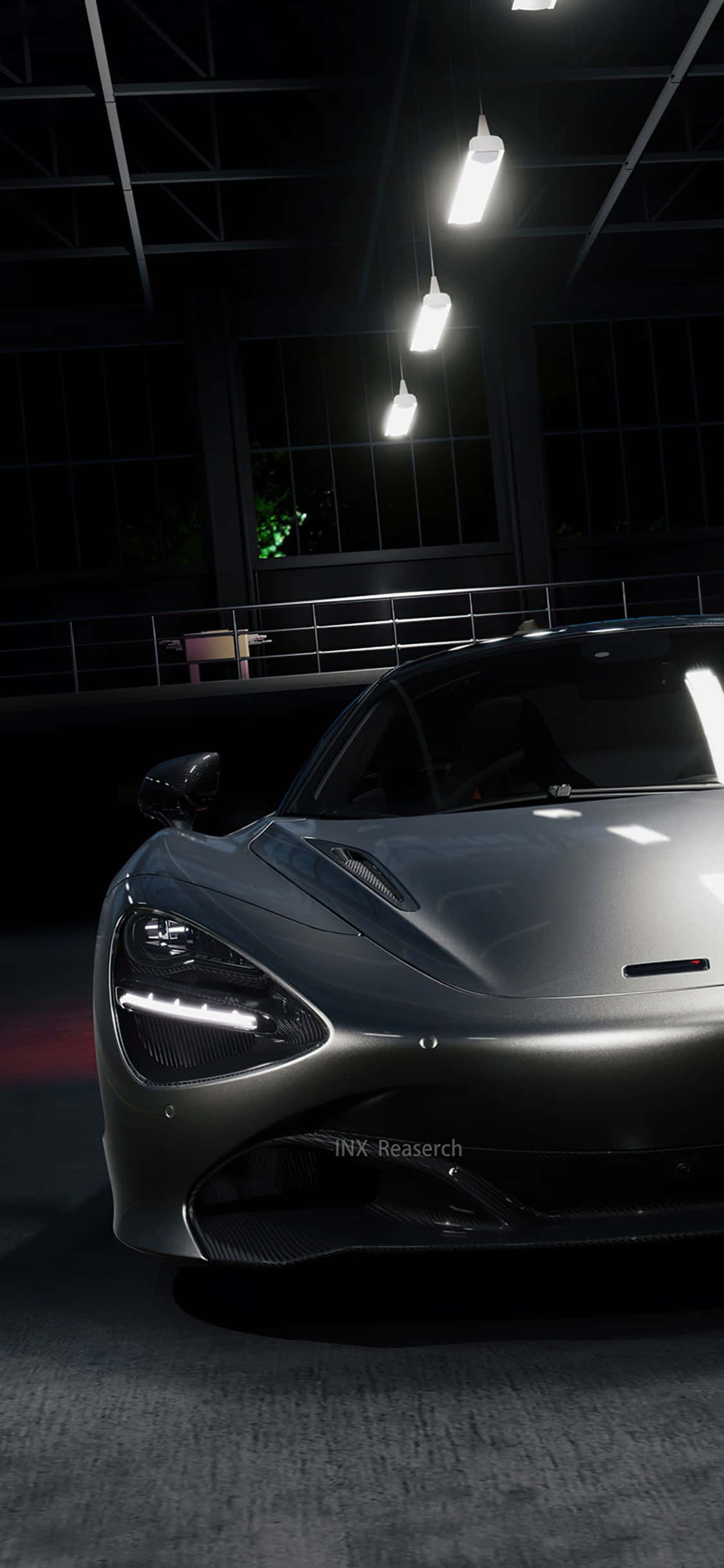 iPhone Xs Mclaren 720s 桌布 壁紙 — 一輛時尚的銀色跑車在夜間黑暗的工業車庫中，在懸掛的燈光下閃閃發光。
