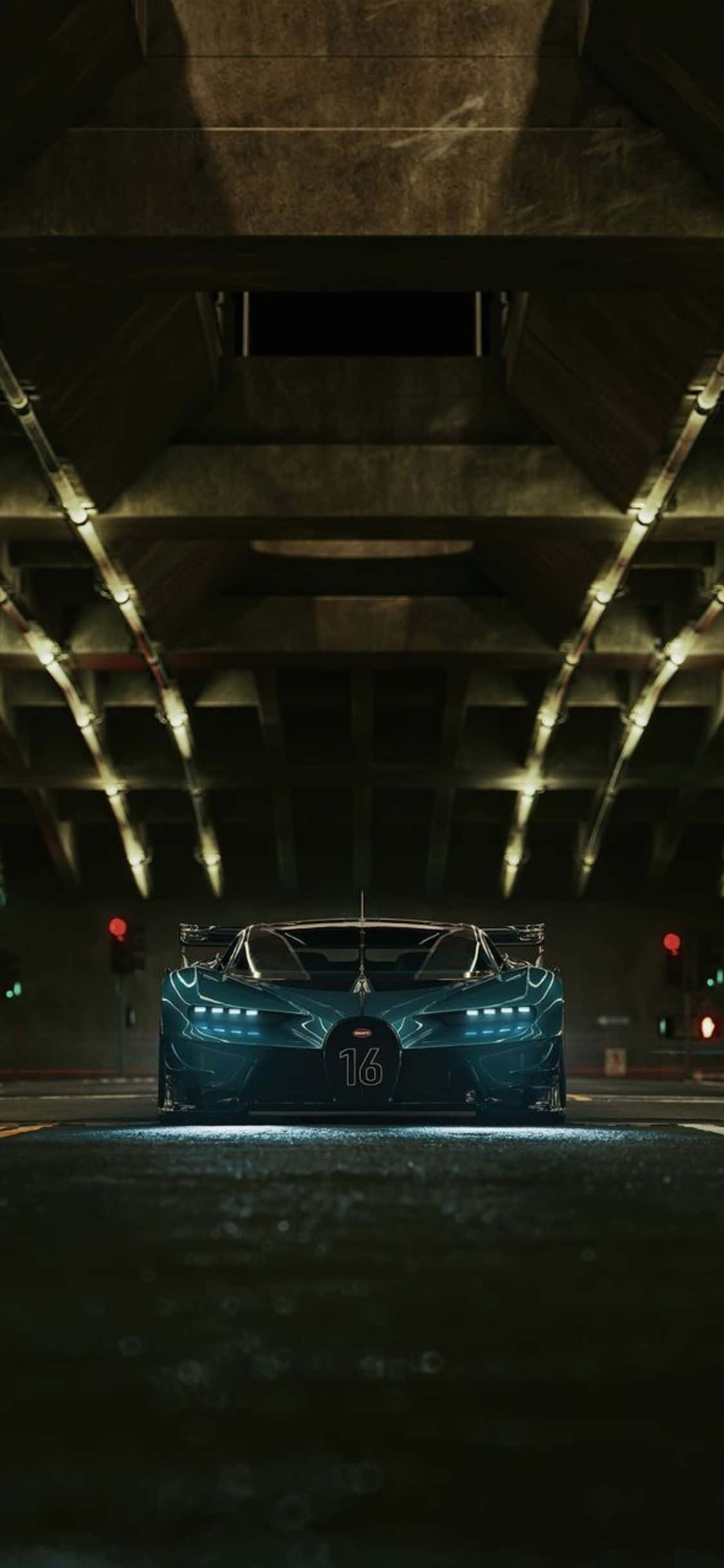 iPhone Xs Bugatti 桌布 壁紙 — 一輛時尚的青綠色賽車，車號16，在隧道燈光下閃耀，被混凝土拱門和發光的交通信號燈框住。