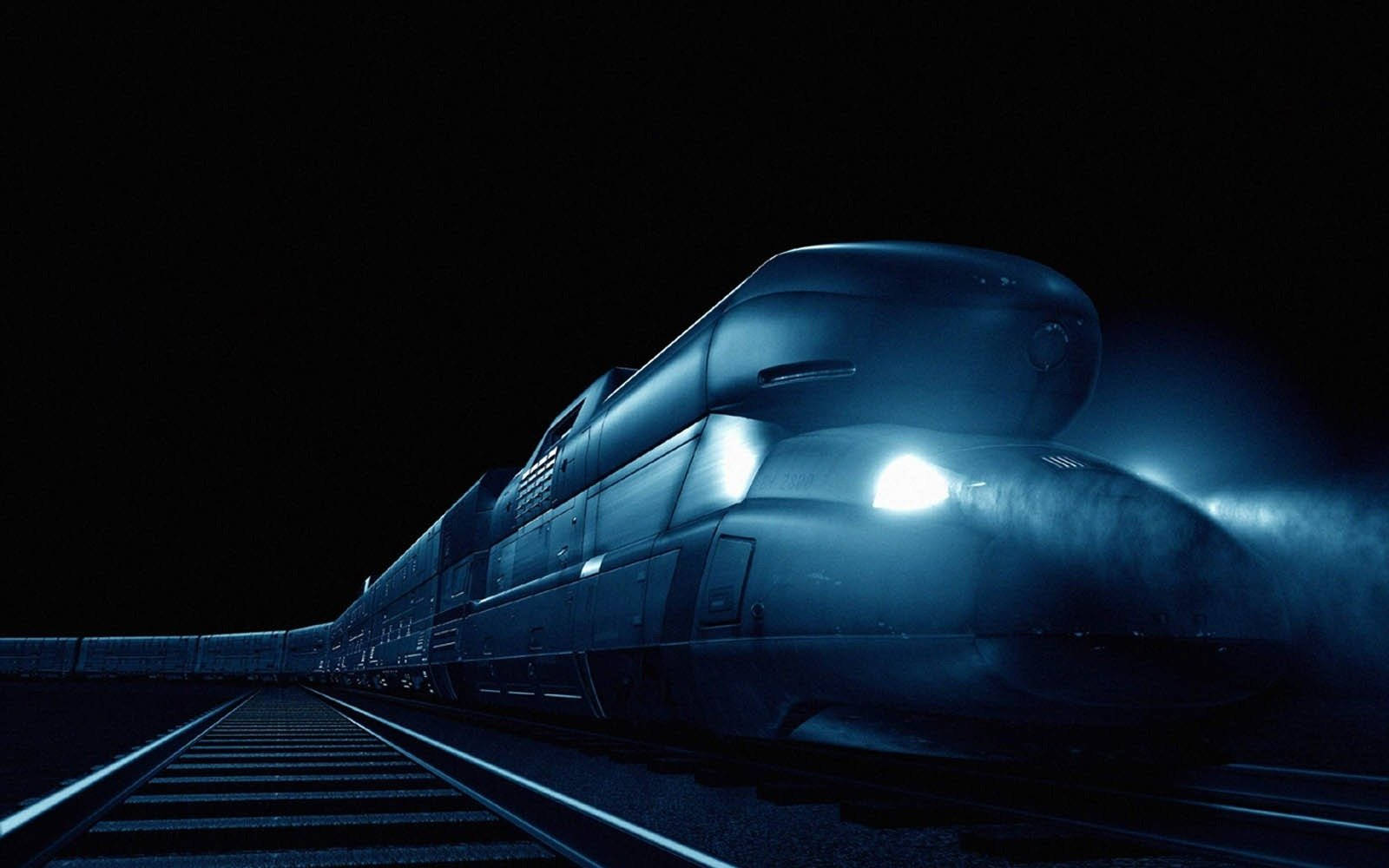 電玩遊戲 桌布 壁紙 — 一輛時尚的高速列車帶著發光的車頭燈在夜間穿過黑暗的隧道，在軌道上投射出藍光。