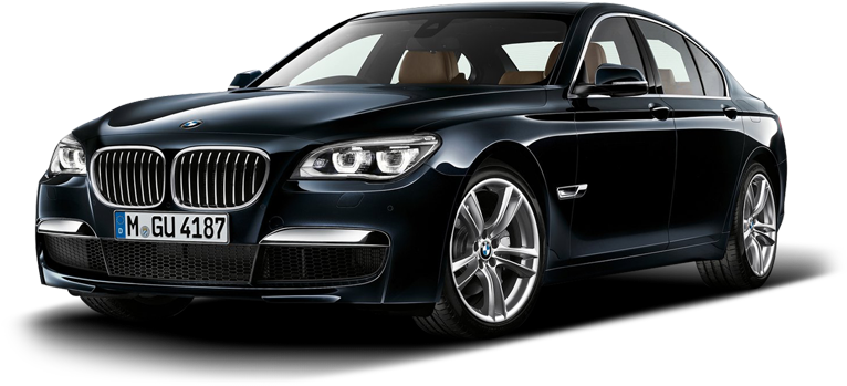 BMW 動圖 桌布 壁紙 — 一輛時尚的黑色BMW 7系列轎車在攝影棚燈光下閃耀，展示其拋光鍍鉻格柵和合金輪圈。