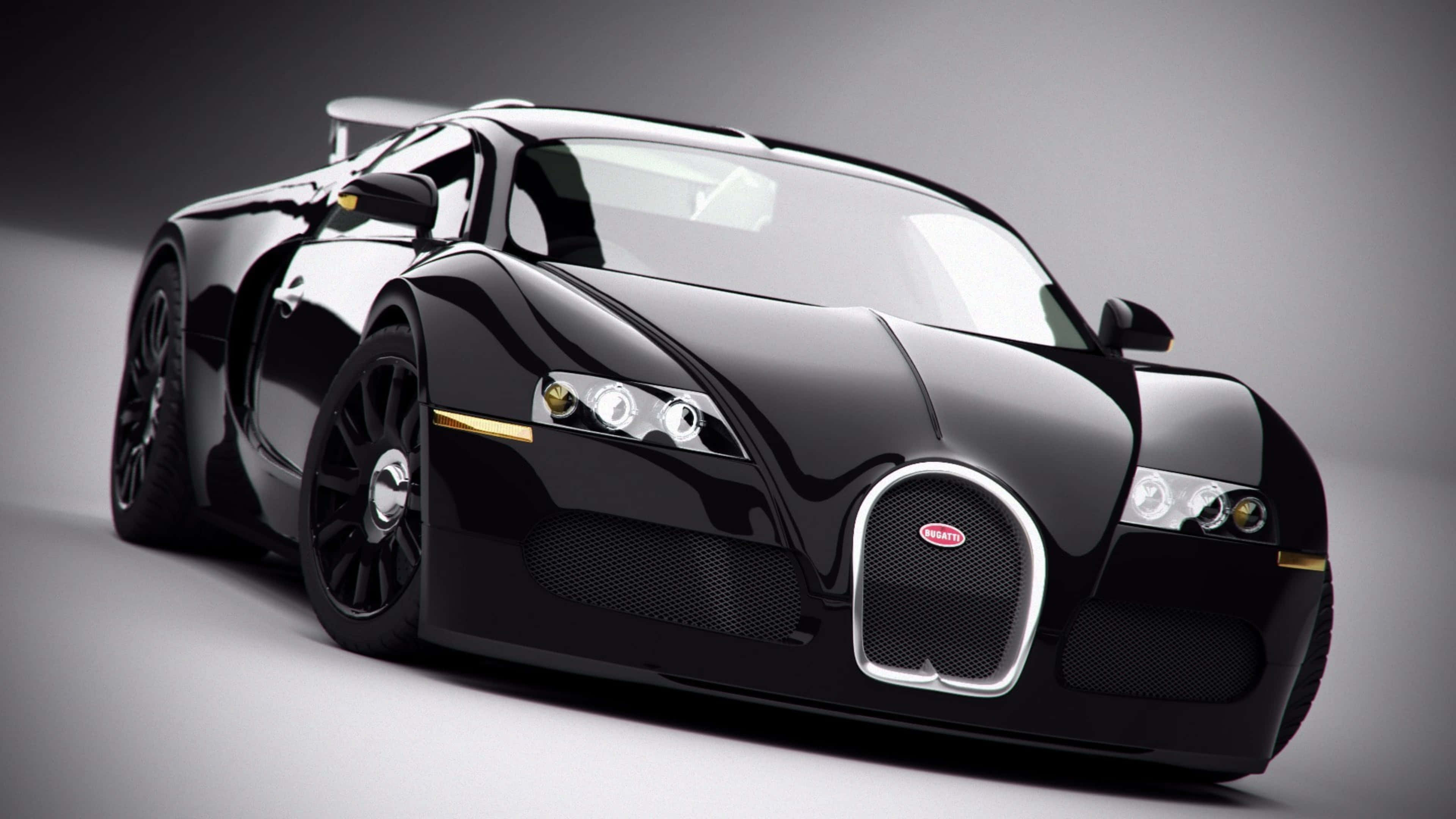 bugatti iPhone 桌布 壁紙 — 一輛時尚的黑色Bugatti Veyron跑車，帶有金色裝飾，在灰色漸變背景下的攝影棚燈光中閃閃發光。