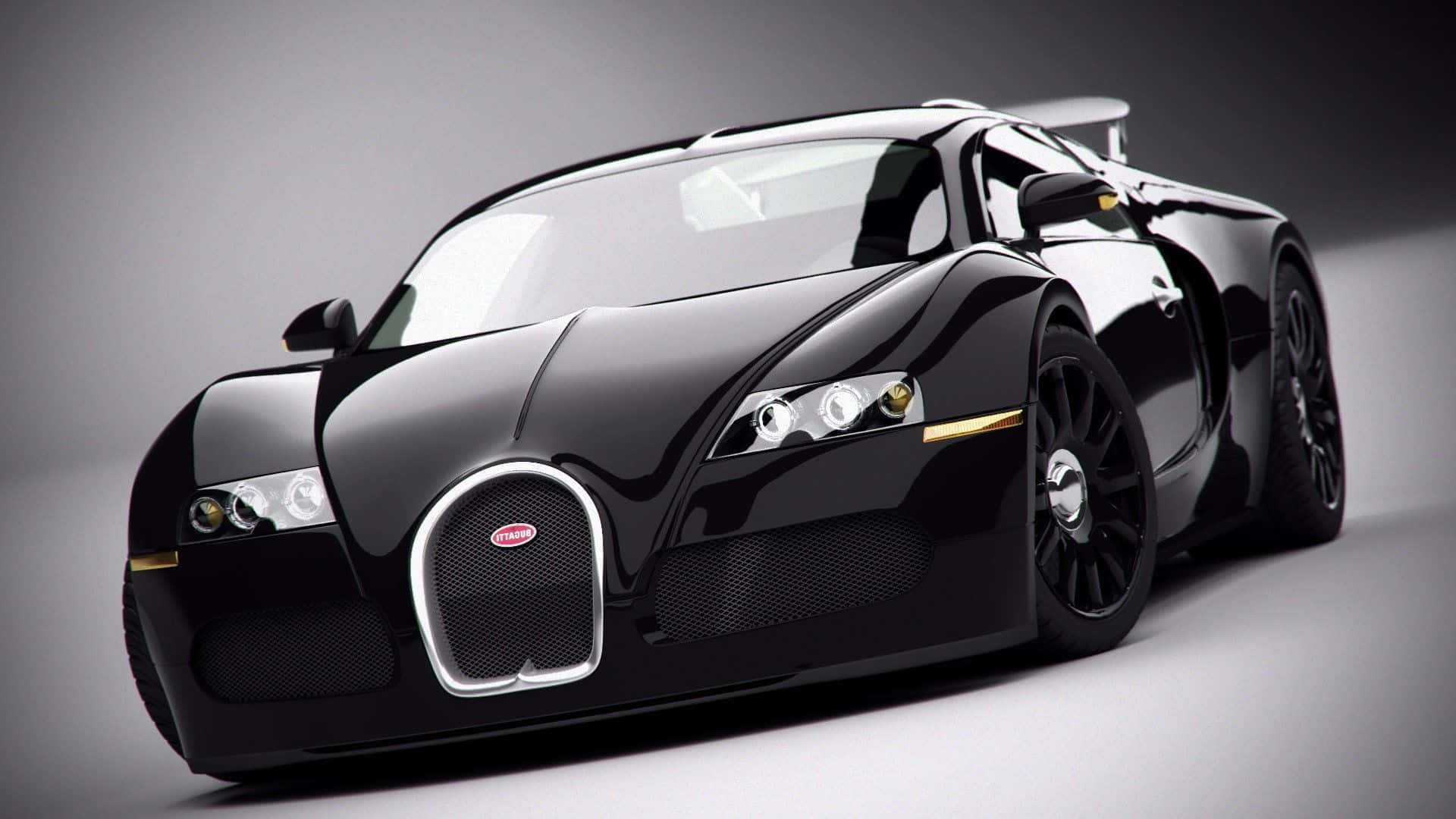 霧面黑色 桌布 壁紙 — 一輛時尚的黑色Bugatti Veyron跑車在工作室燈光下閃耀，帶有金色裝飾和戲劇性的低角度拍攝。