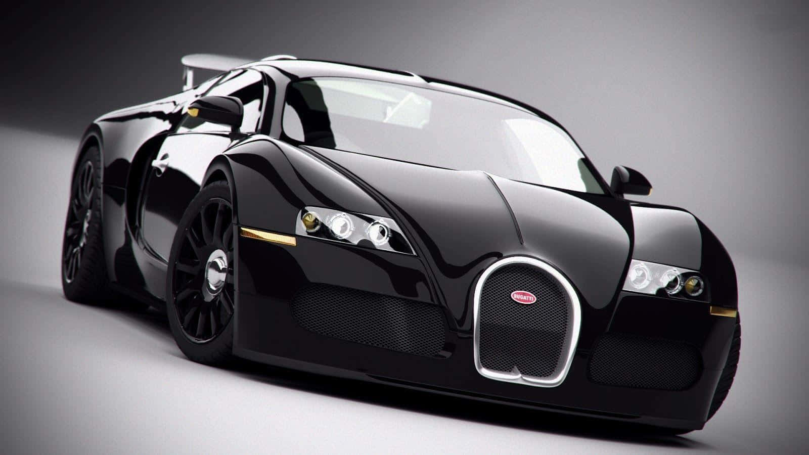跑車 桌布 壁紙 — 一輛時尚的黑色Bugatti Veyron跑車帶有金色點綴，在灰色背景下的攝影棚燈光中閃耀。